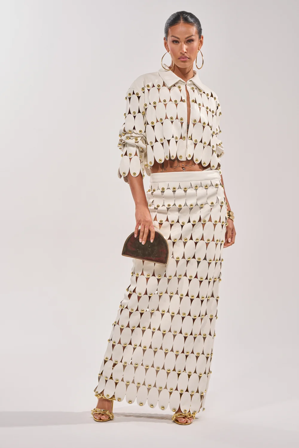 THE SNEAK PEEK STUDDED PU MIDI SKIRT IN WHITE - Akira Store