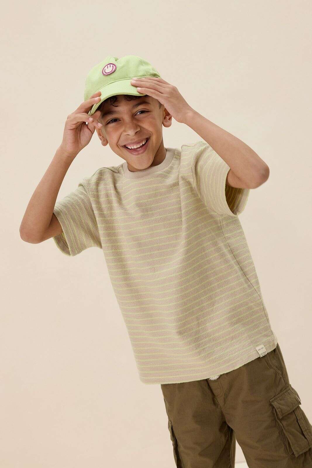 Lichtgroene pet met smiley