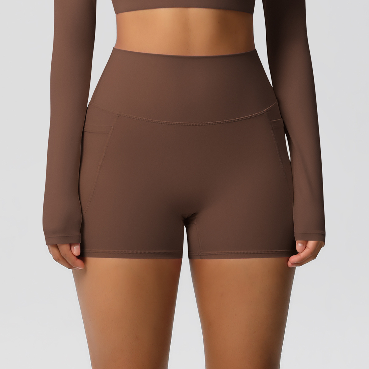 High-waisted, tight-fitting, stretchy yoga shorts with pockets