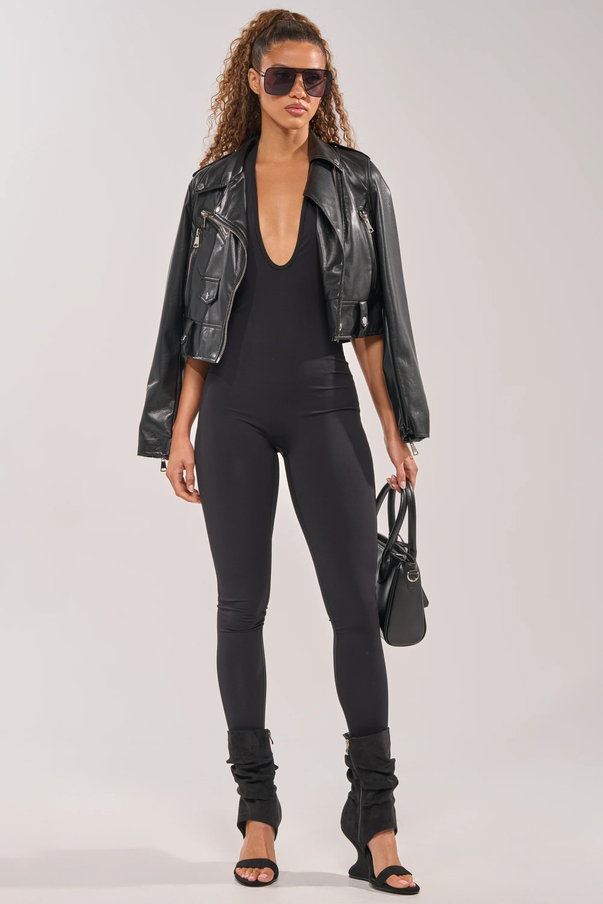 HIGH STANDARDS SLEEVELESS HALTER JUMPSUIT - Akira Store