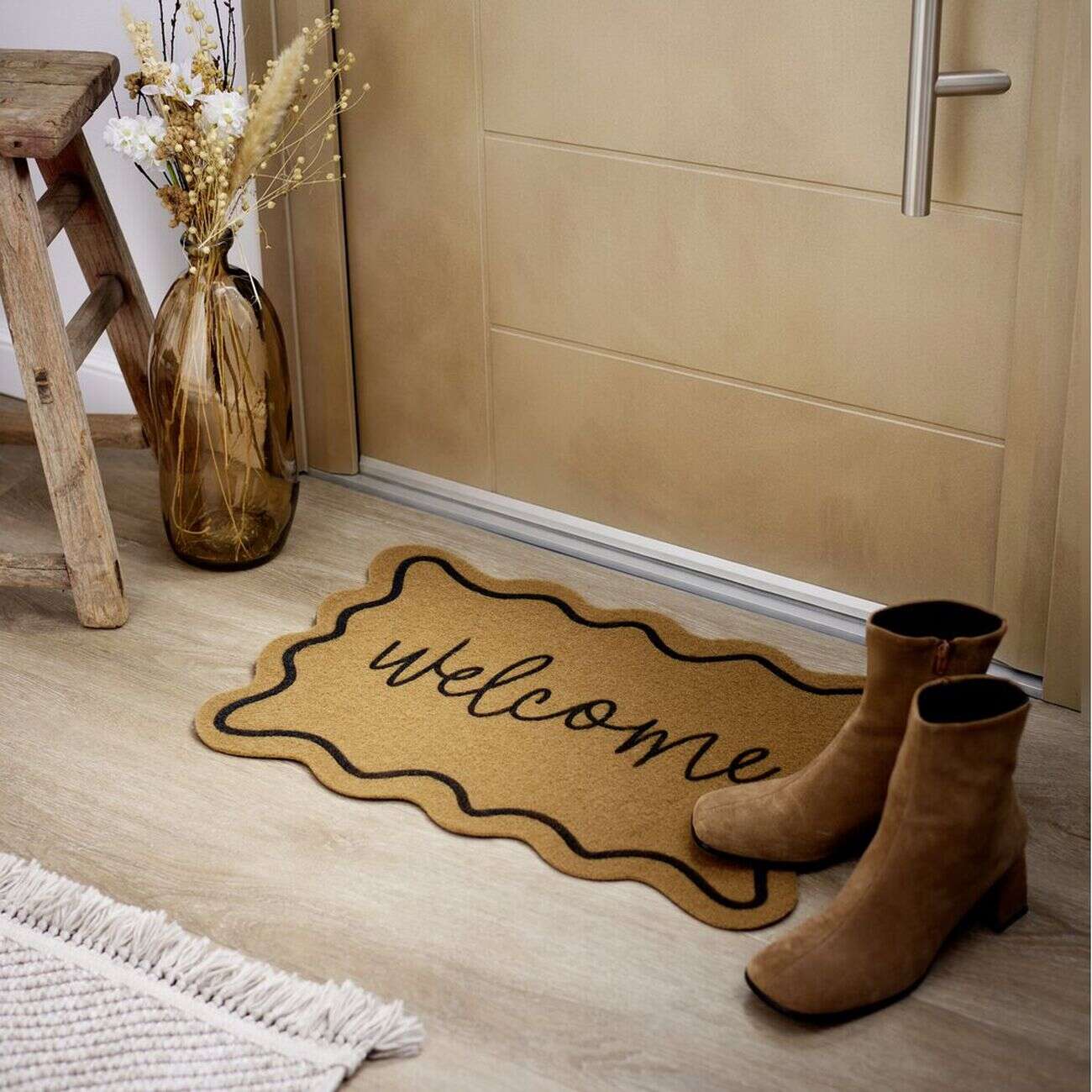 Paillasson extérieur contour vague inscription Welcome marron et noir 40x60cm
