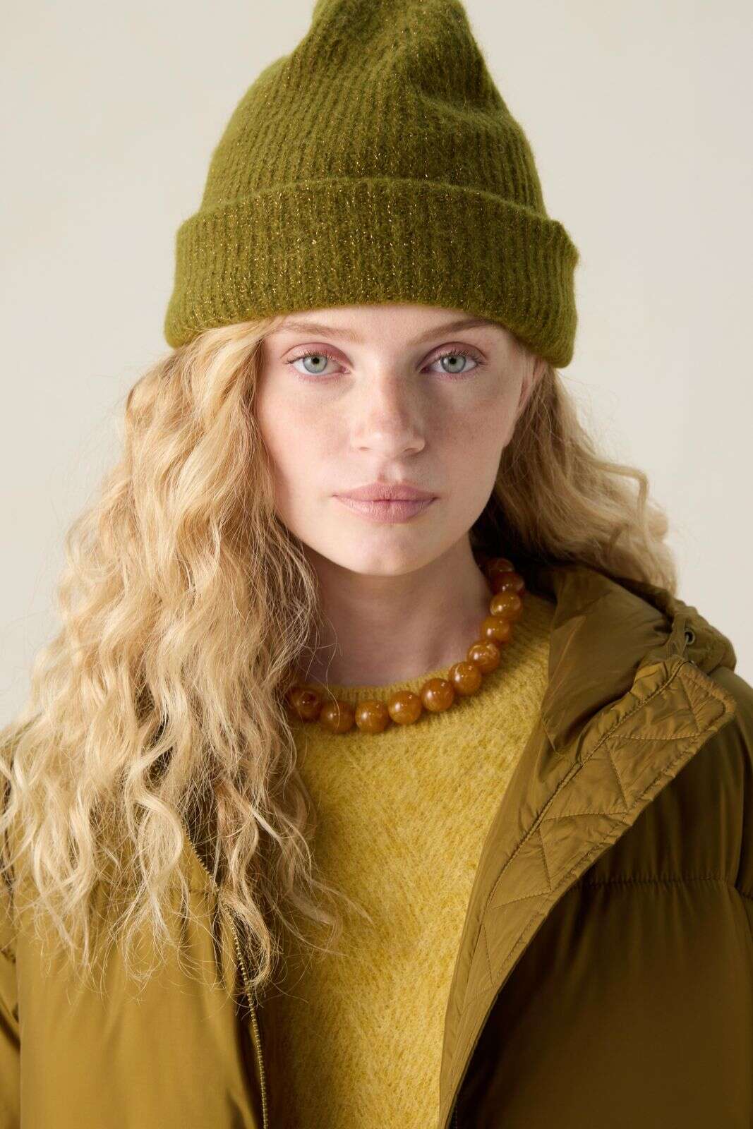 Donkergroene muts met lurex