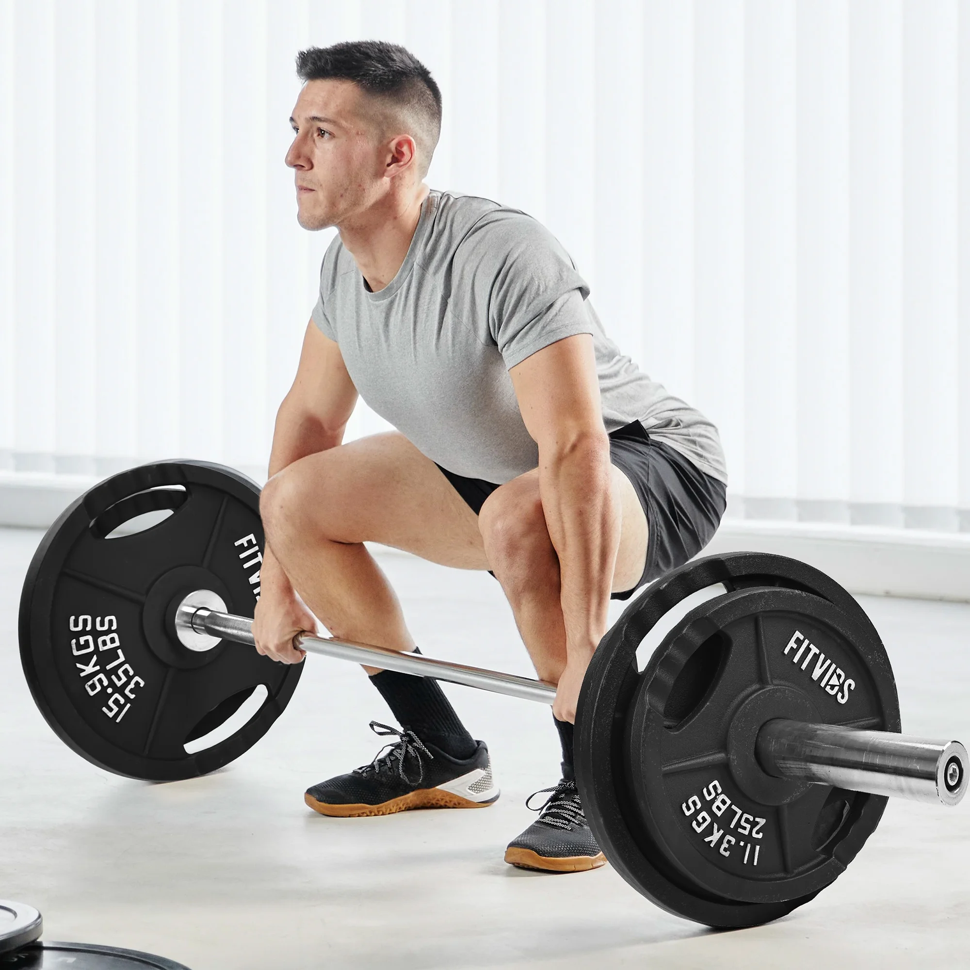 Flexwave 2 - Hole Cast Iron Weight Plate Set, 110 lb - 230 lb, Strength Training Plates for Home Gym