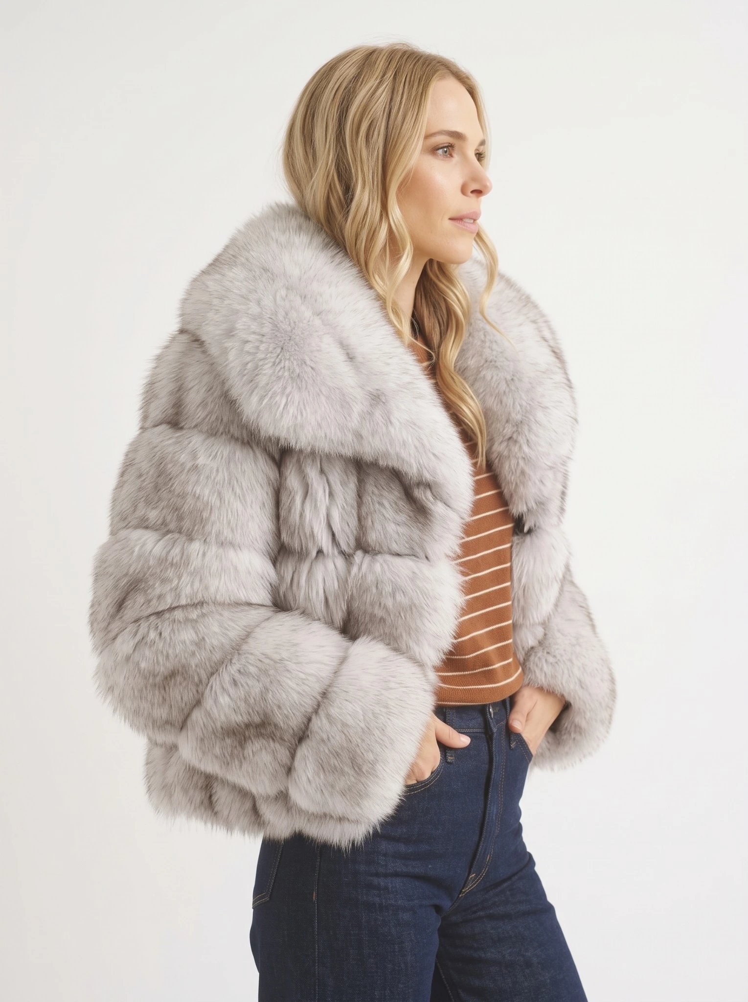 three-quarter.webp	Three-quarter view of a woman wearing a gray short faux fur jacket with an oversized collar