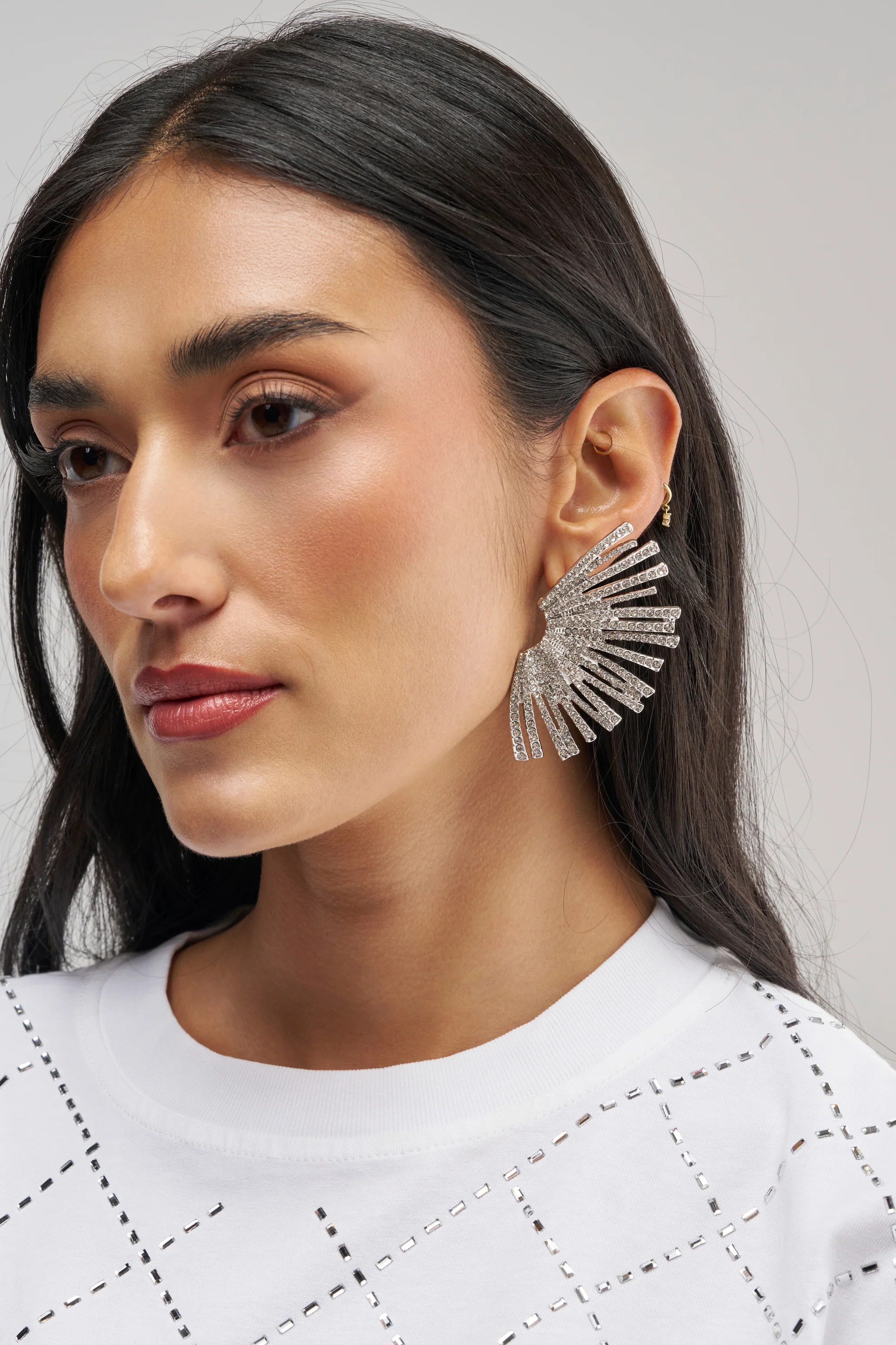 CRYSTAL STARBURST EARRINGS IN CLEAR - Akira Store