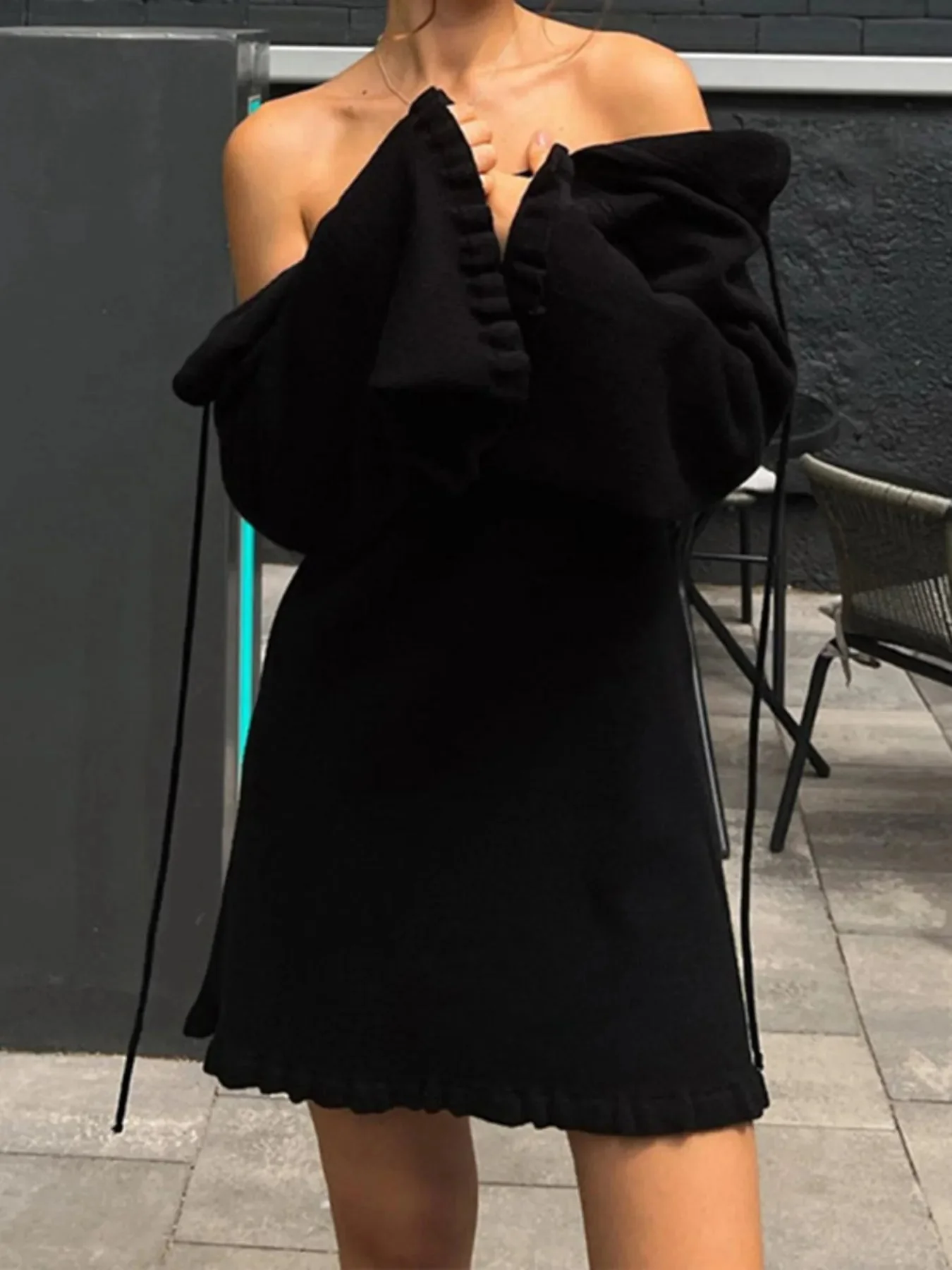 Robe pull en maille à manches longues et dos nu
