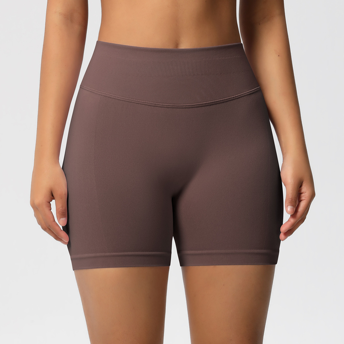 Women's high-waisted yoga shorts with a peach-shaped design and lifts the buttocks.