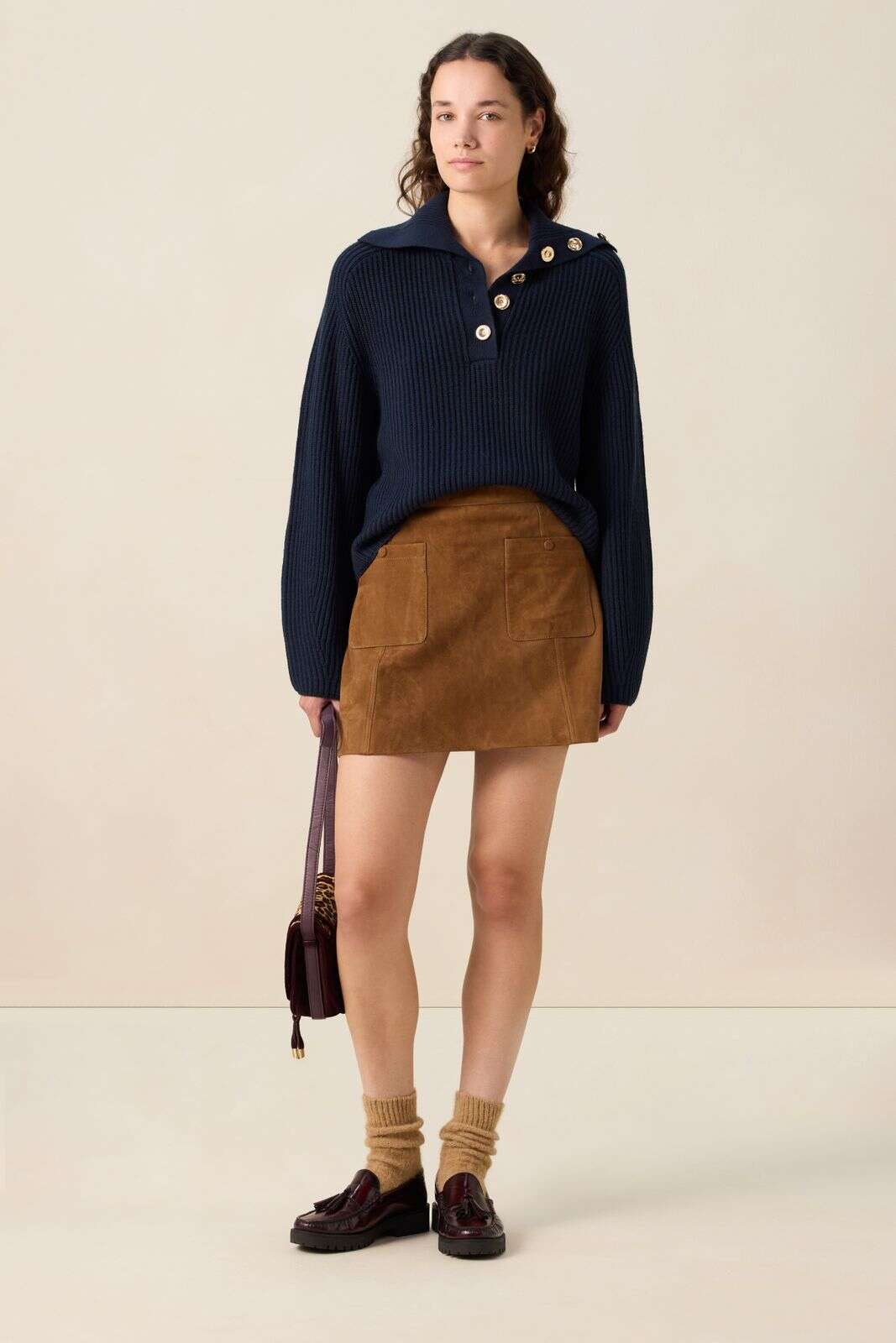 Donkerblauwe trui met knopen