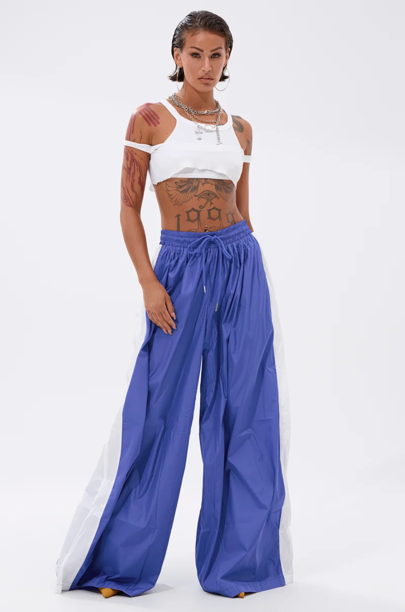 BREAKING THE RULES TRACK PANT IN ROYAL BLUE - Akira Store