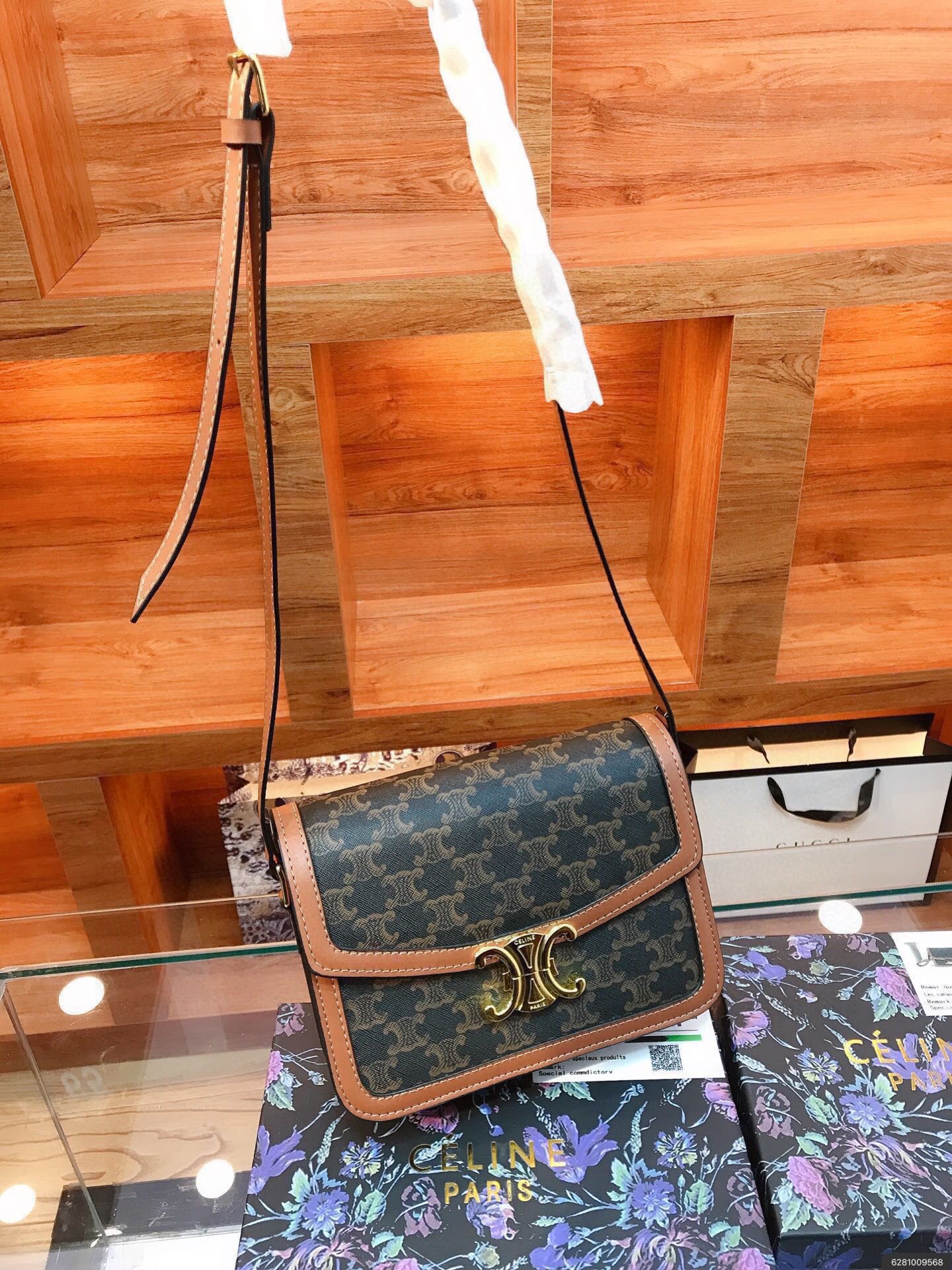 CLASSIQUE TRIOMPHE BAG IN TRIOMPHE CANVAS AND CALFSKIN TAN