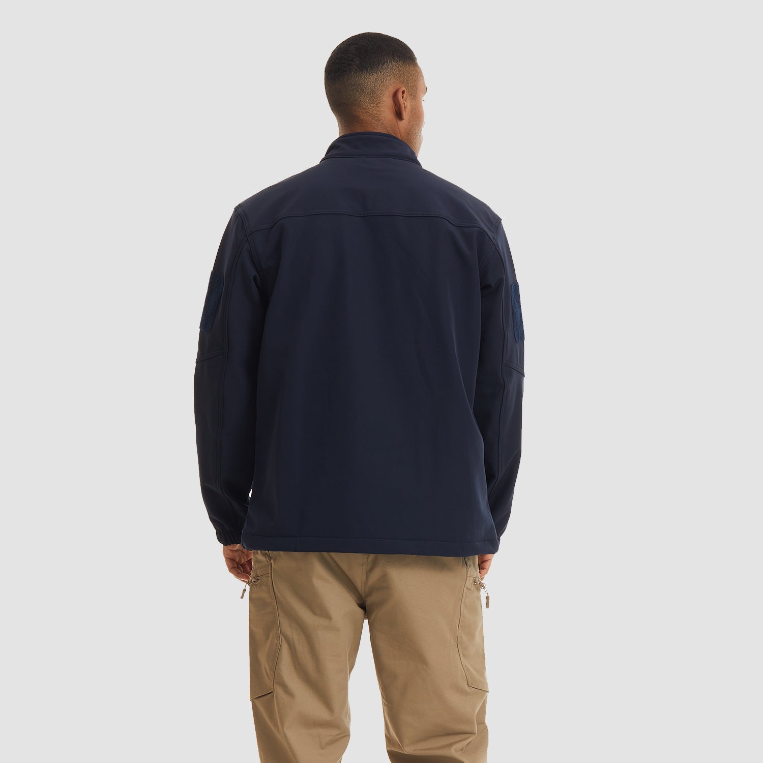 Veste tactique pour homme, imperméable, 6 poches, doublure polaire softshell, idéale pour la randonnée et l'hiver.