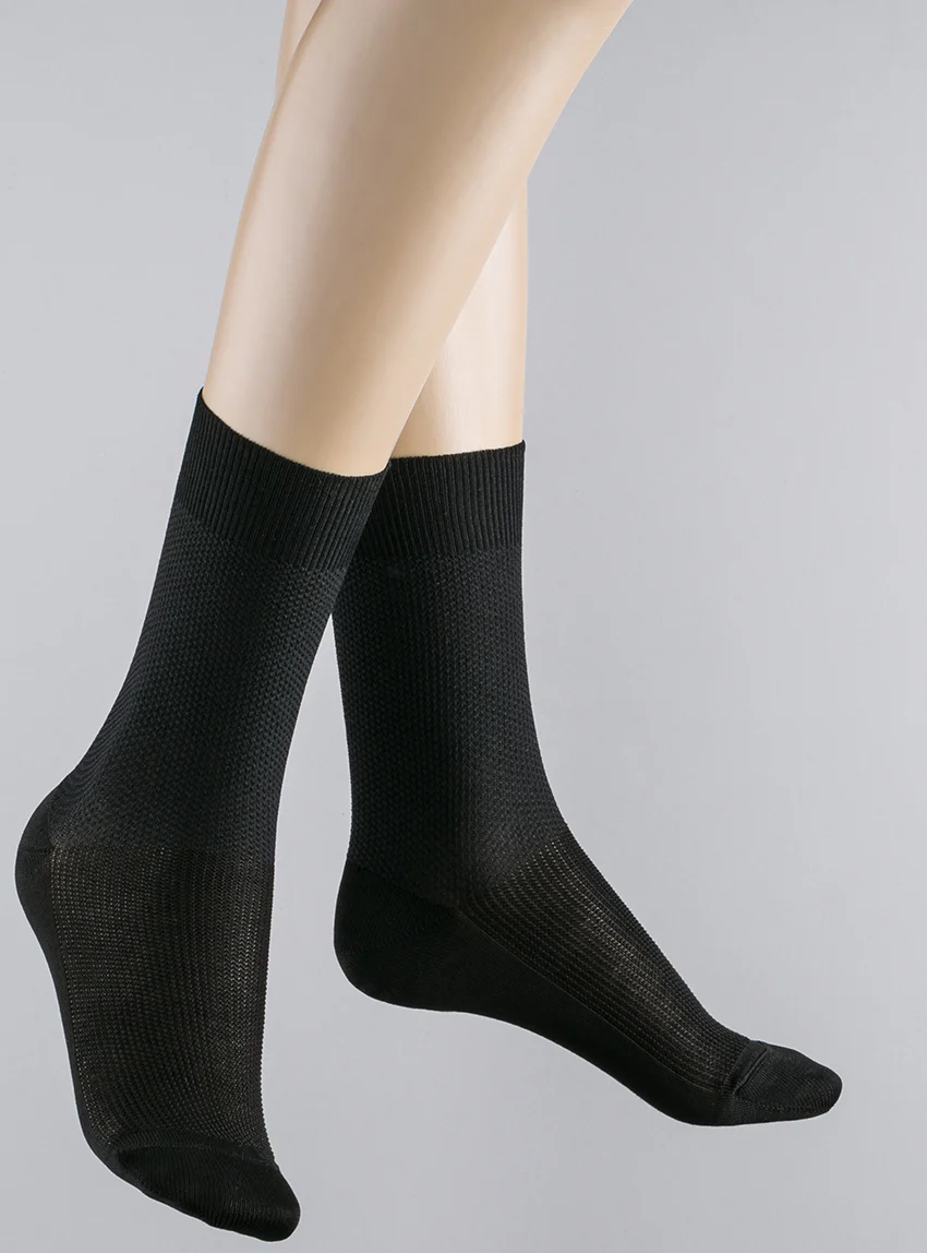 Mi-chaussettes énergétiques en coton noires