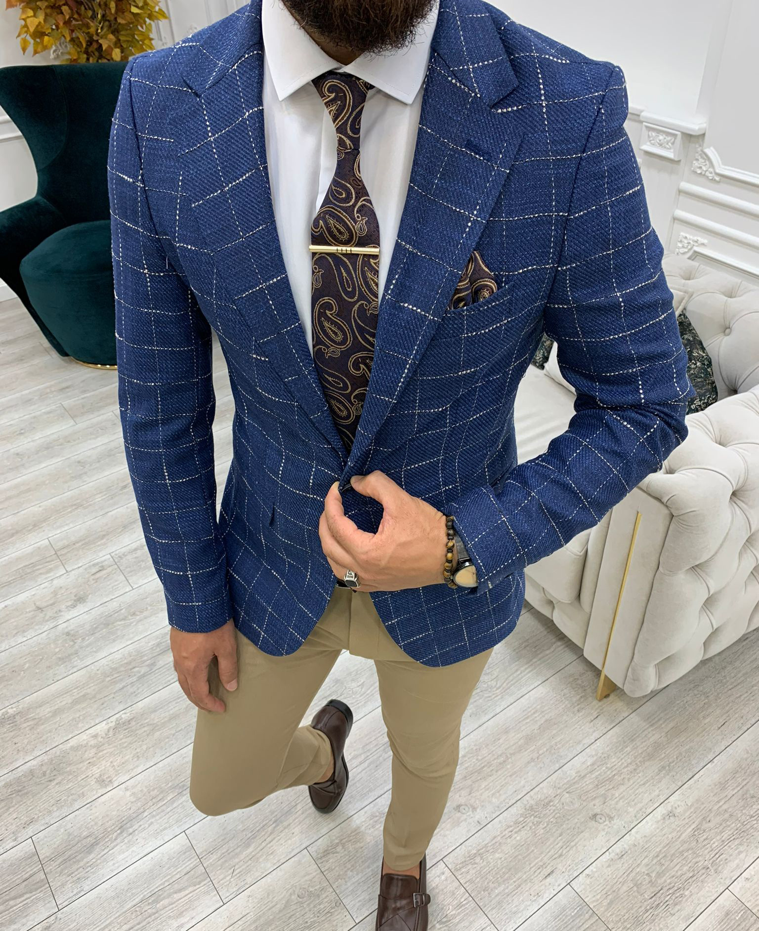 Blazer à carreaux d'affaires avec poches boutonnées et revers cranté