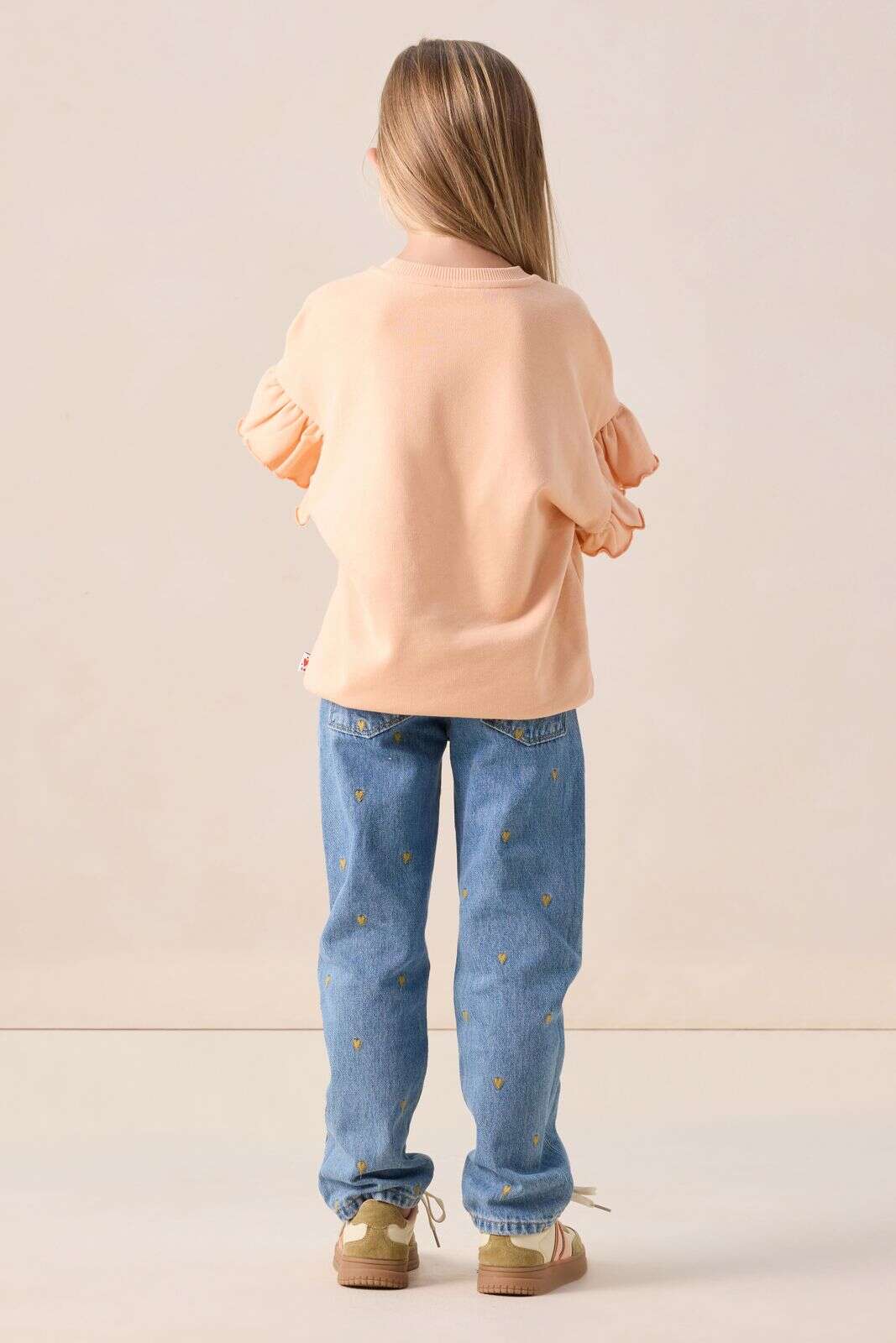 Lichtoranje ruffle sweater