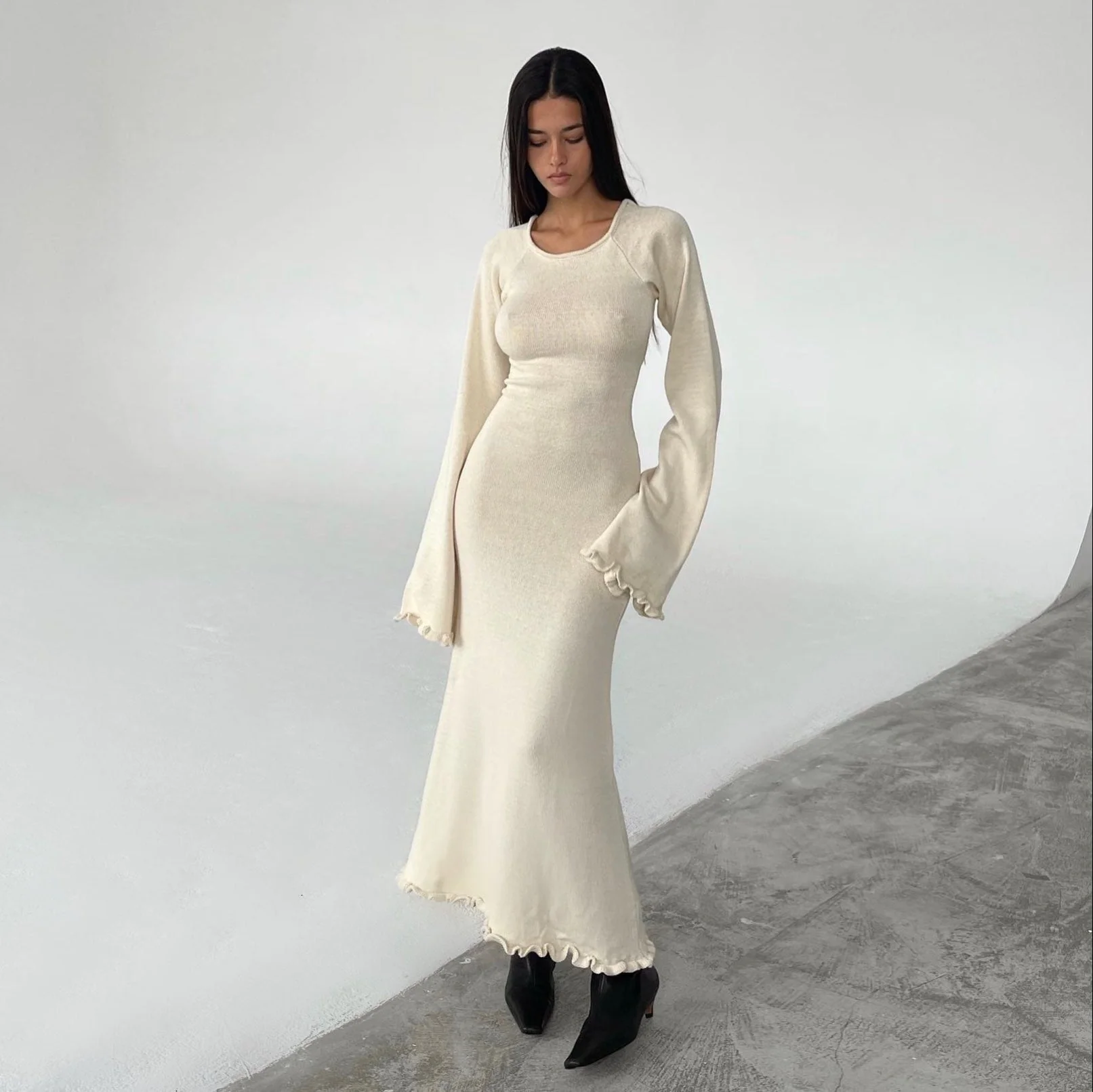 Robe longue en maille nuage ivoire à dos ouvert