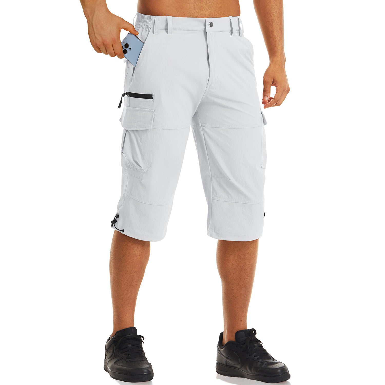 Short de sport pour homme avec 7 poches, séchage rapide, coupe 3/4 capri, idéal pour la randonnée.