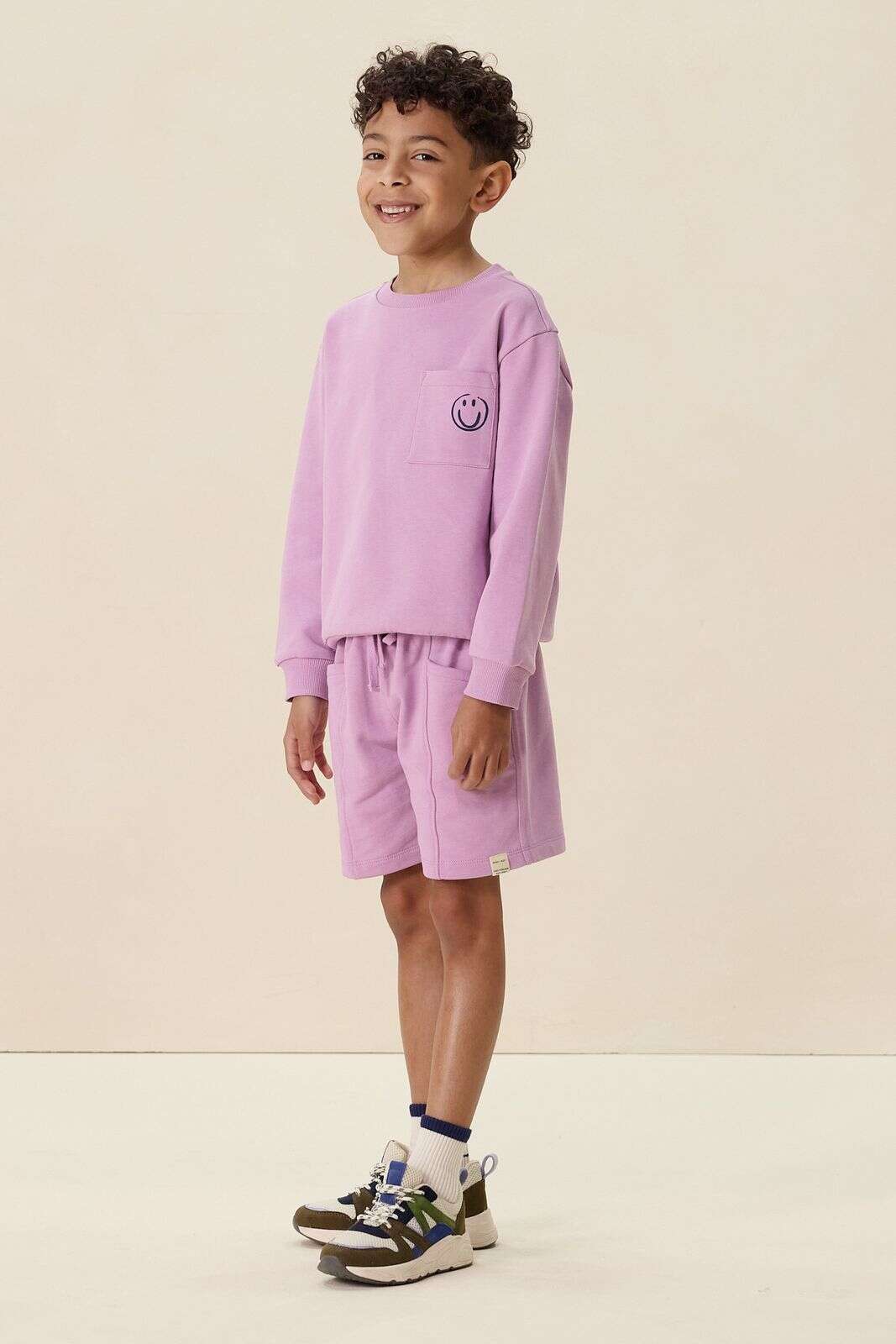 Lichtpaarse sweater met artwork