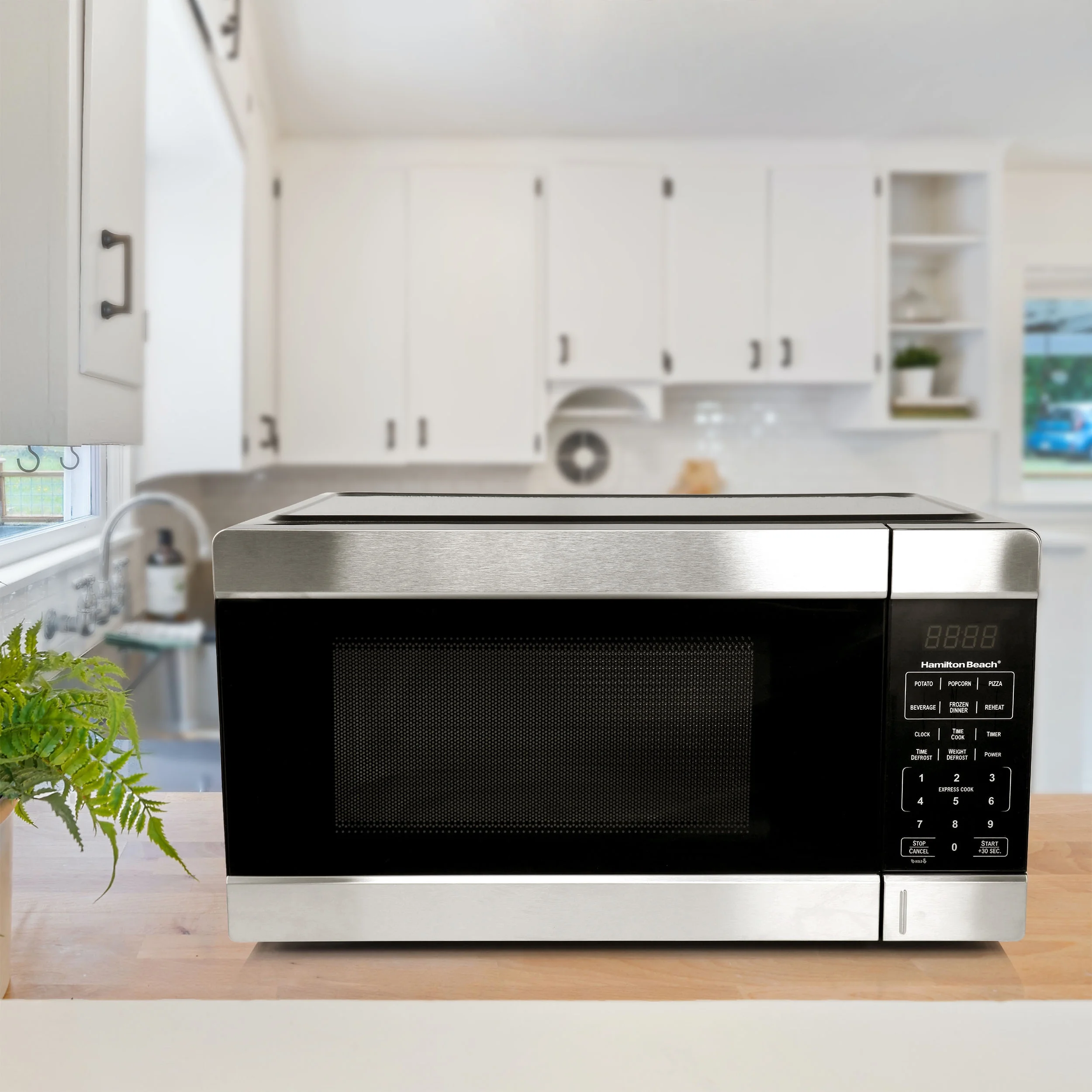 Hamilton Beach 1.1 Cu. Ft. 1000 Watt Countertop Microwave Oven in Black