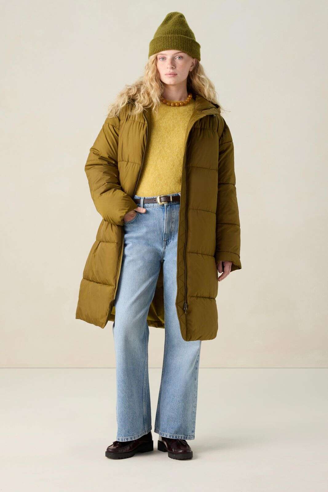 Donkergroene lange puffer jas