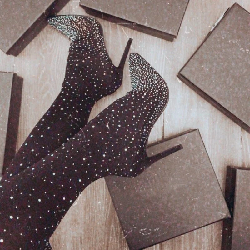 Bottes mi-cuisses étincelantes en faux diamant
