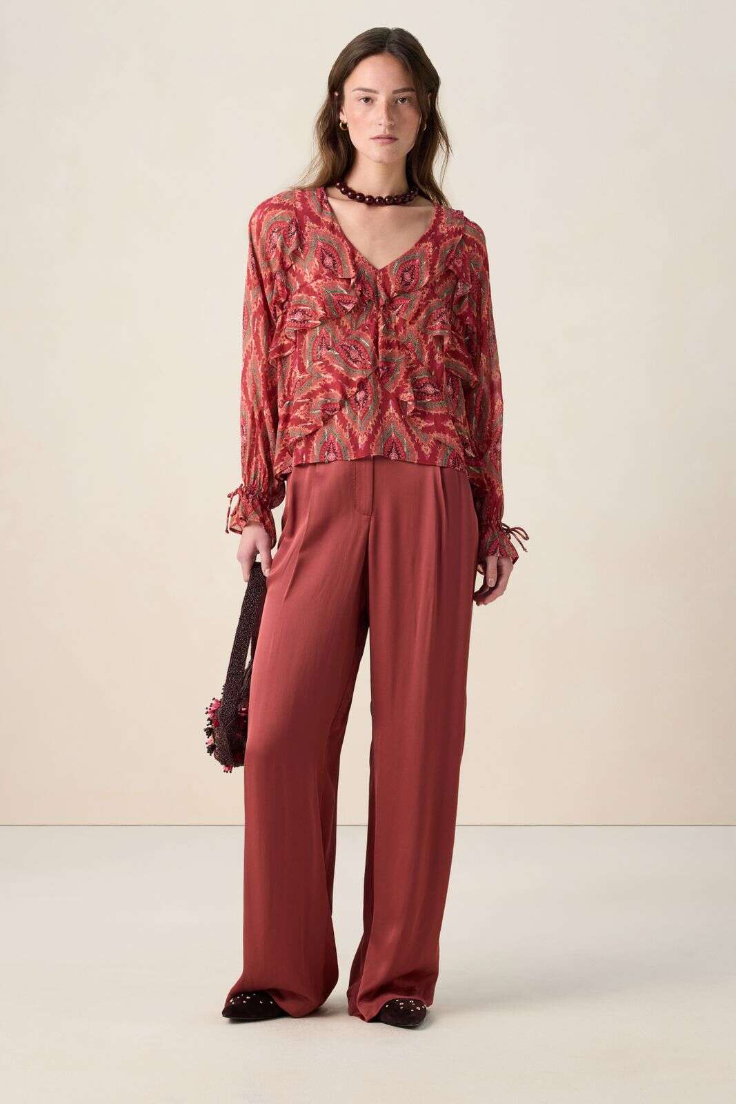 Rode ruffle blouse met print