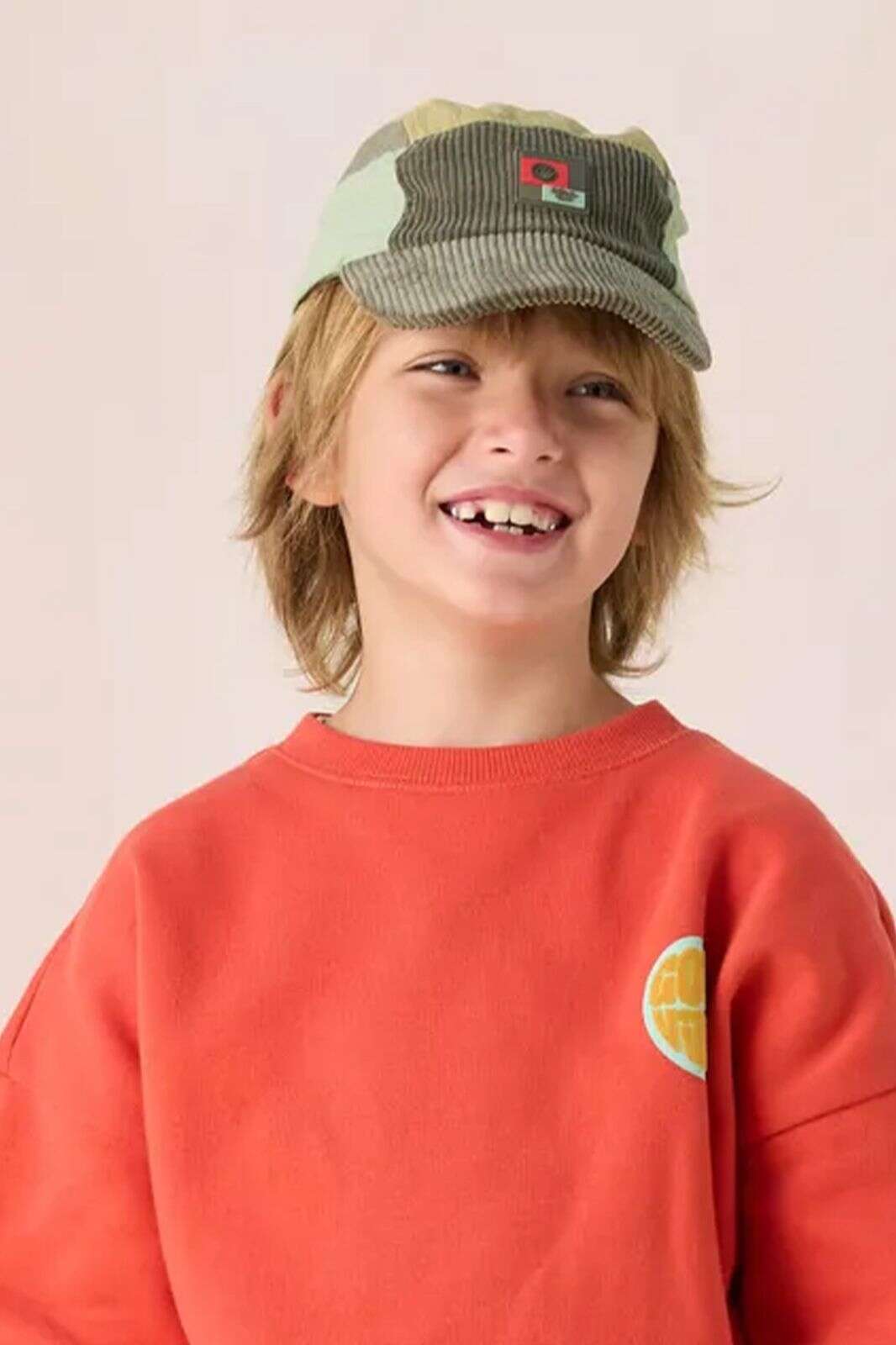 Donkergroene colourblock pet met patch