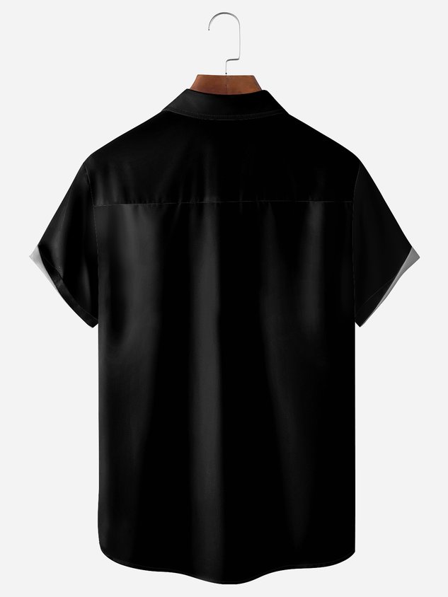 Chemise décontractée à manches courtes avec poche poitrine et motif tête de mort d'Halloween