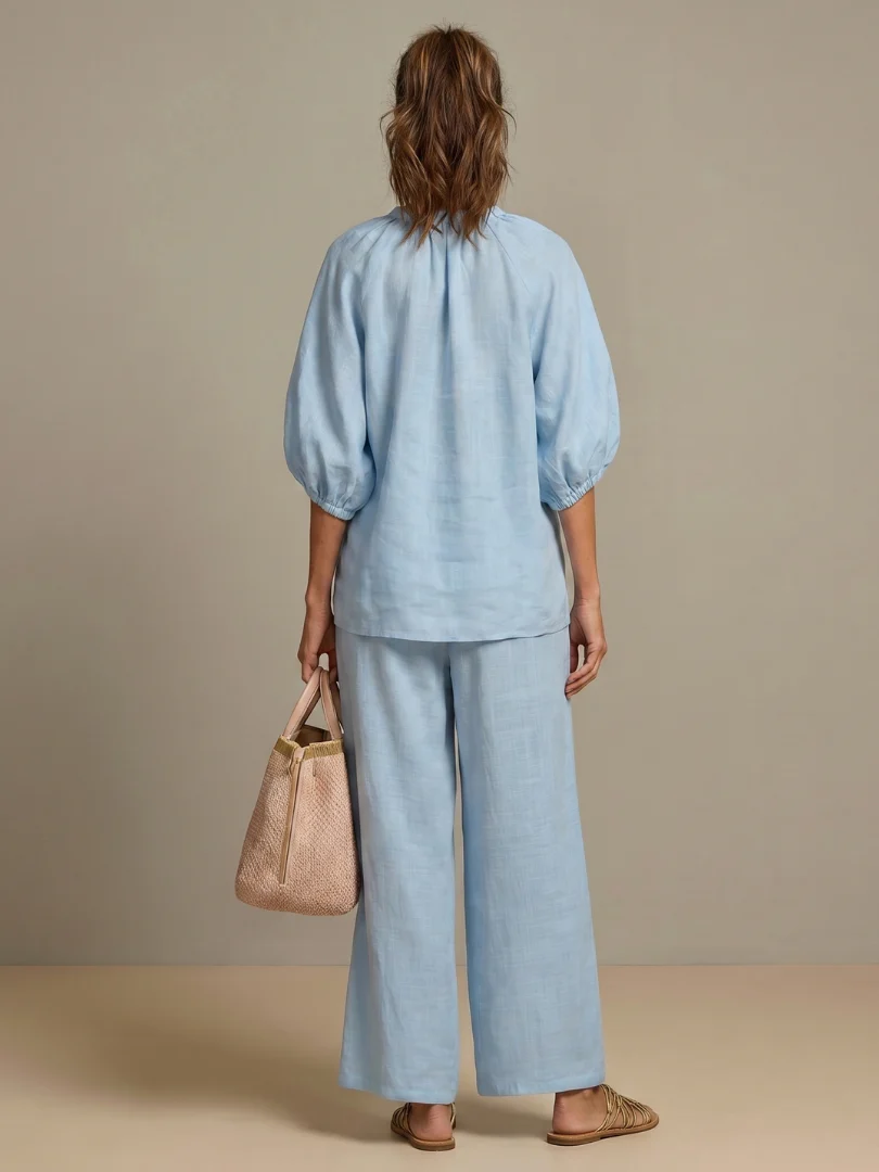 Ensemble blouse zippée et pantalon à jambes larges pour femme