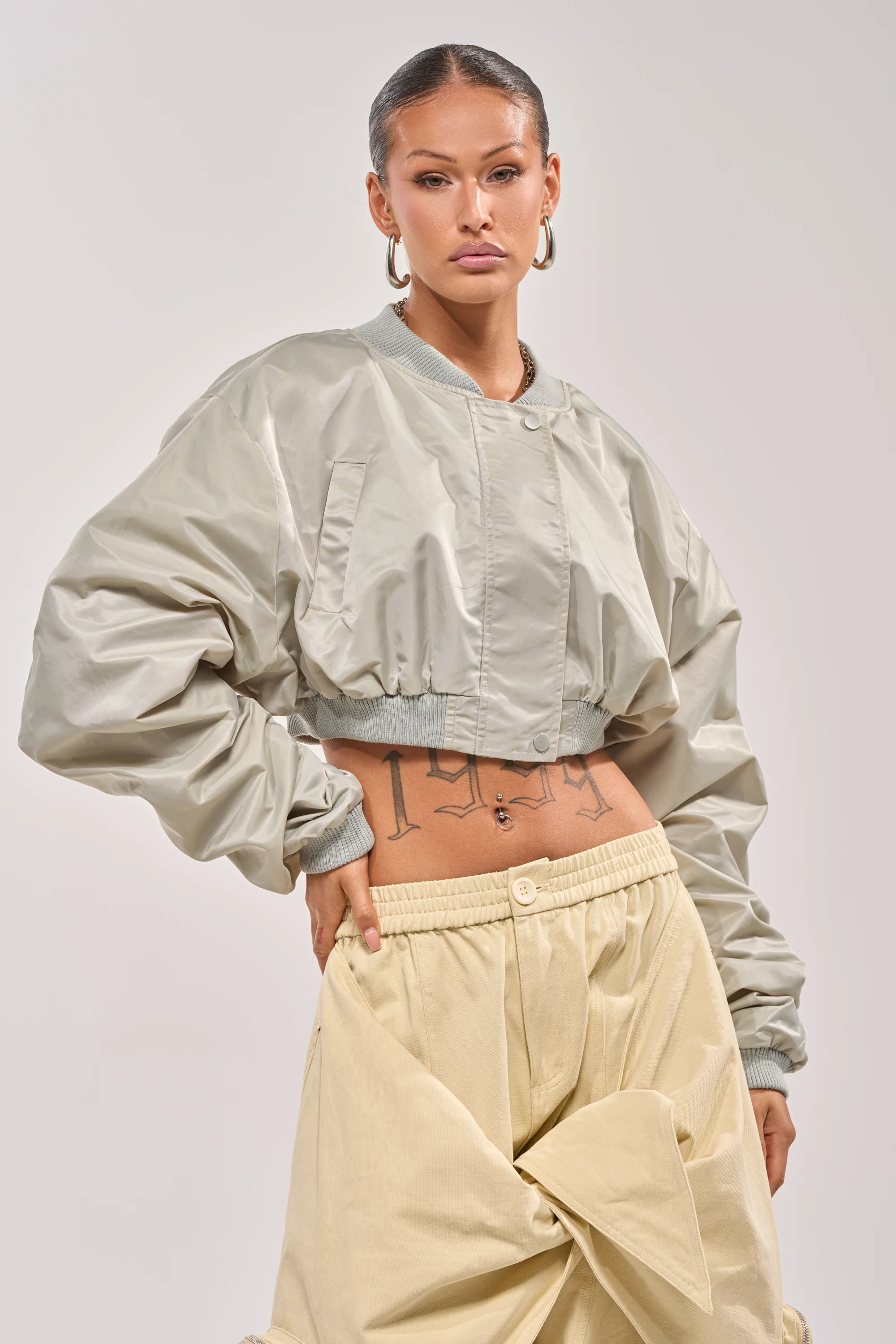 TAKE IT EASY CROPPED BOMBER IN SAGE - Akira Store