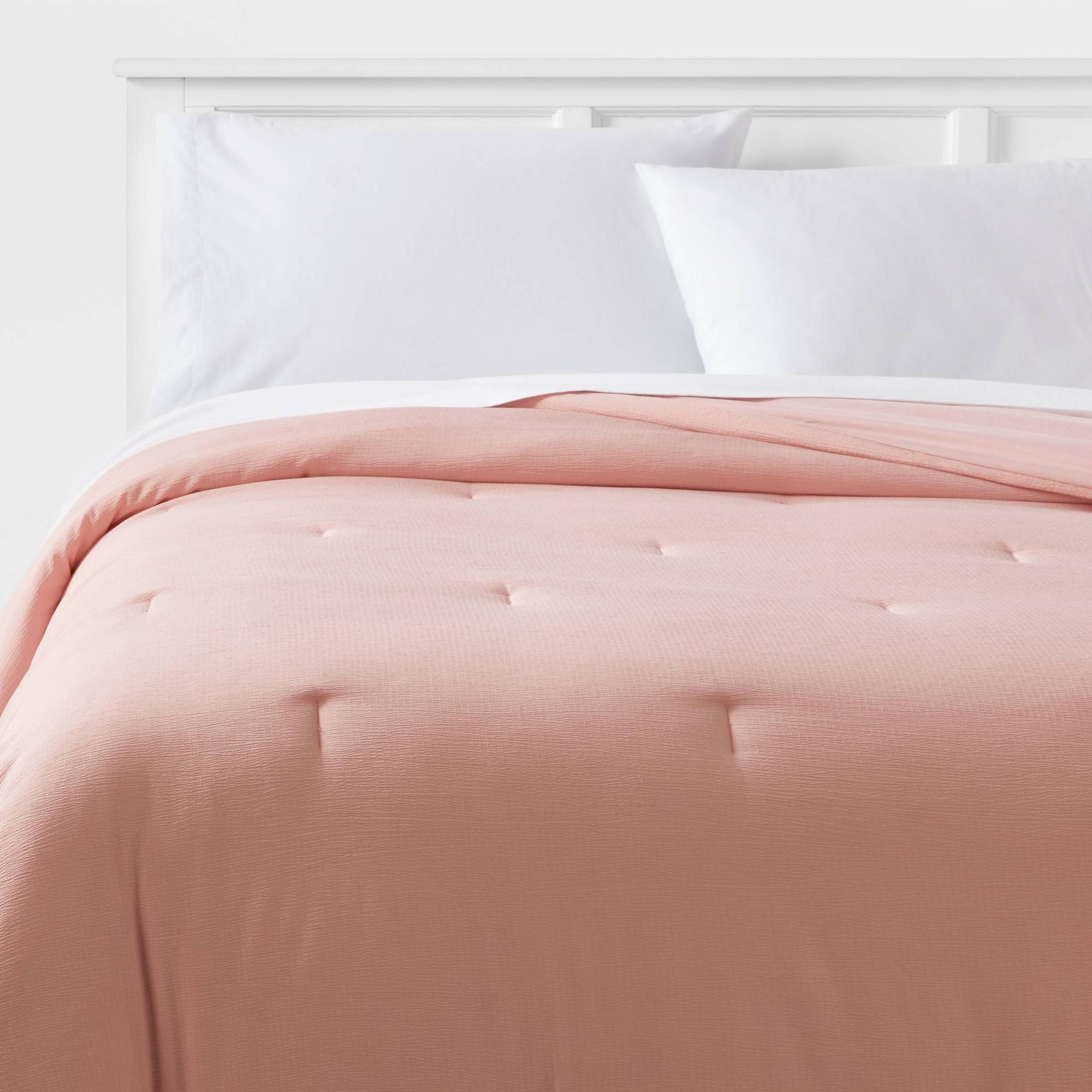 Twin/Twin Extra Long Reversible Microfiber Micro Texture Comforter Light Pink - Room Essentials