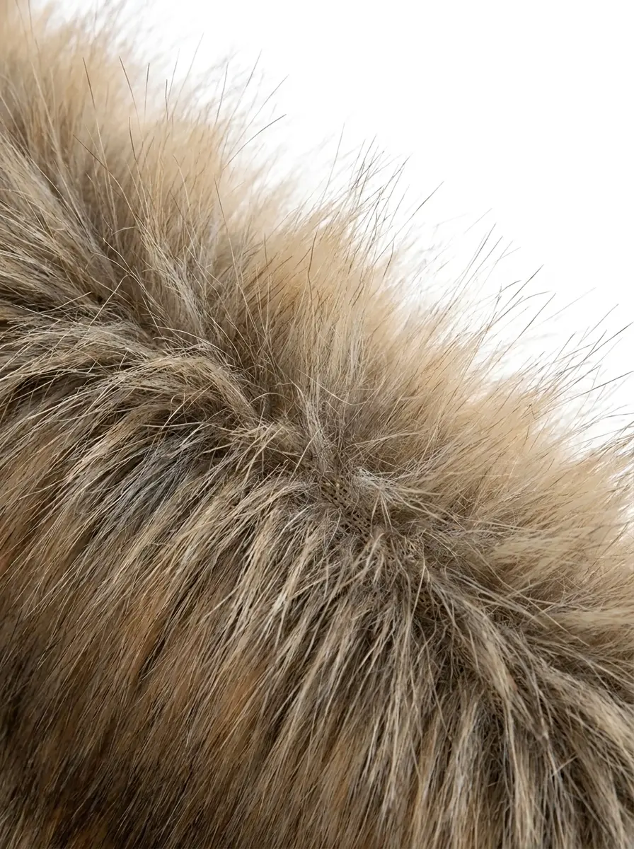 Close-up texture of khaki faux fur on oversized lapel jacket