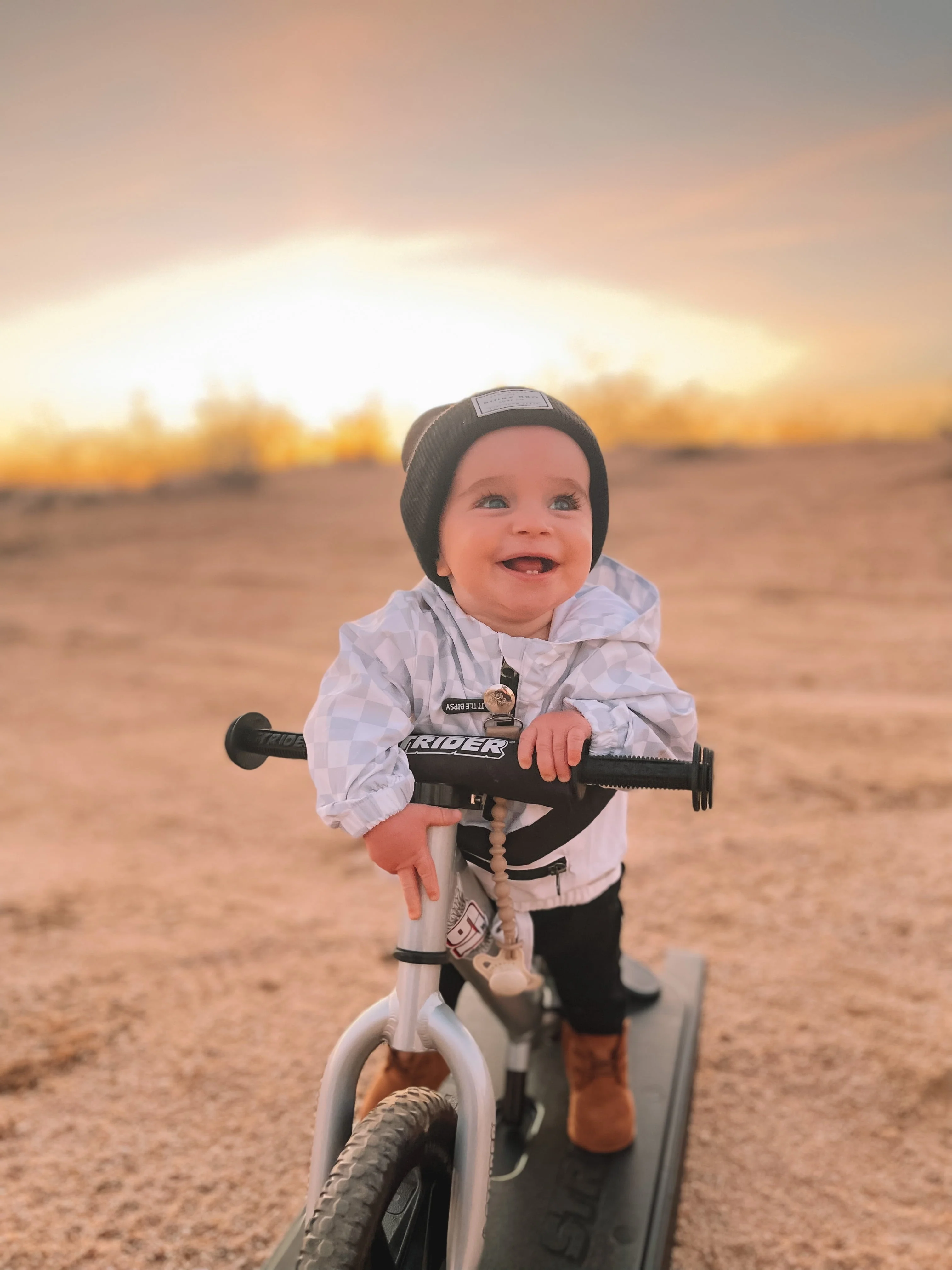 Strider - 12 Pro 2 - in - 1 Rocking Balance Bike, Ages 6 Months to 5 Years - Silver