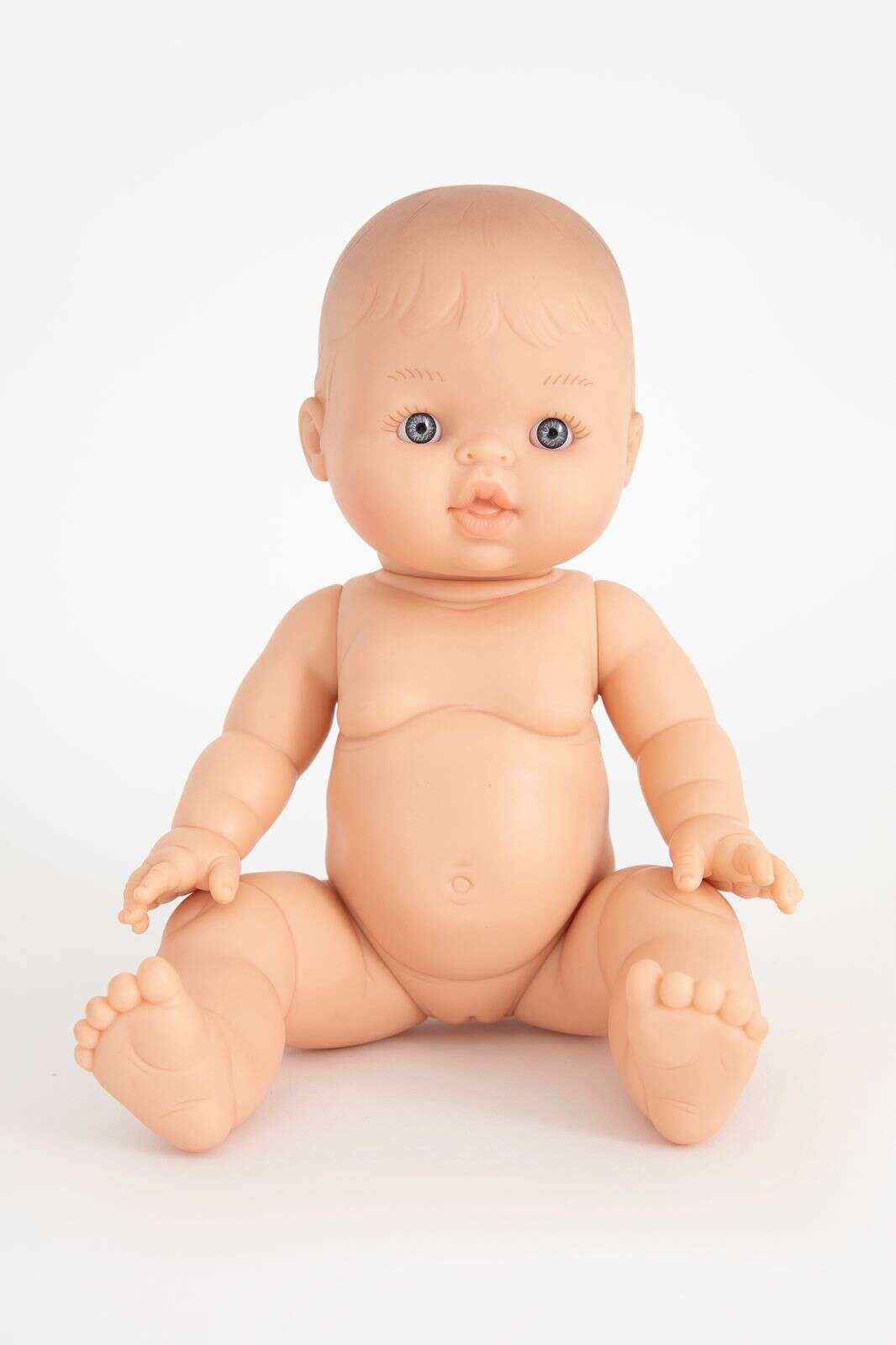 Pop blauwe ogen en zonder haar