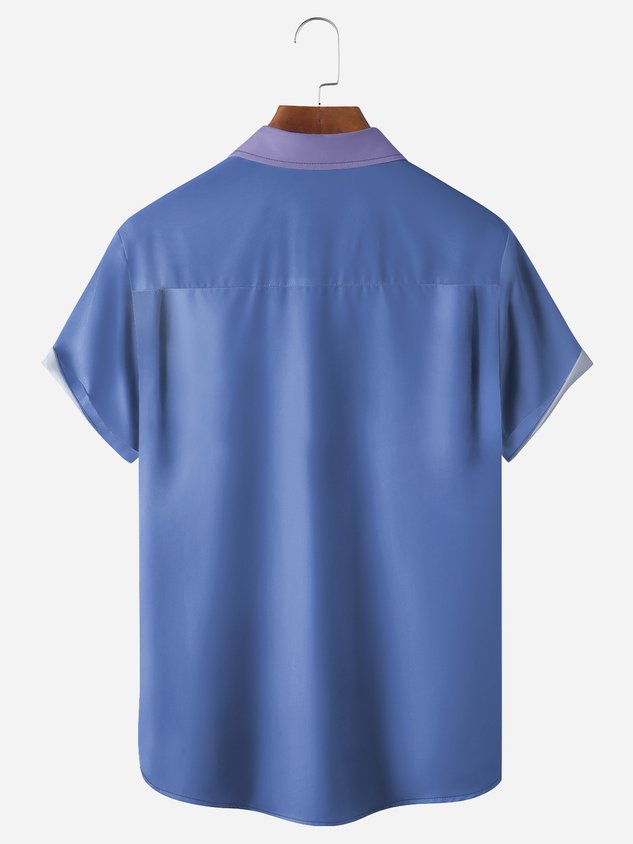 Chemise décontractée à manches courtes avec poche poitrine et personnage de dessin animé