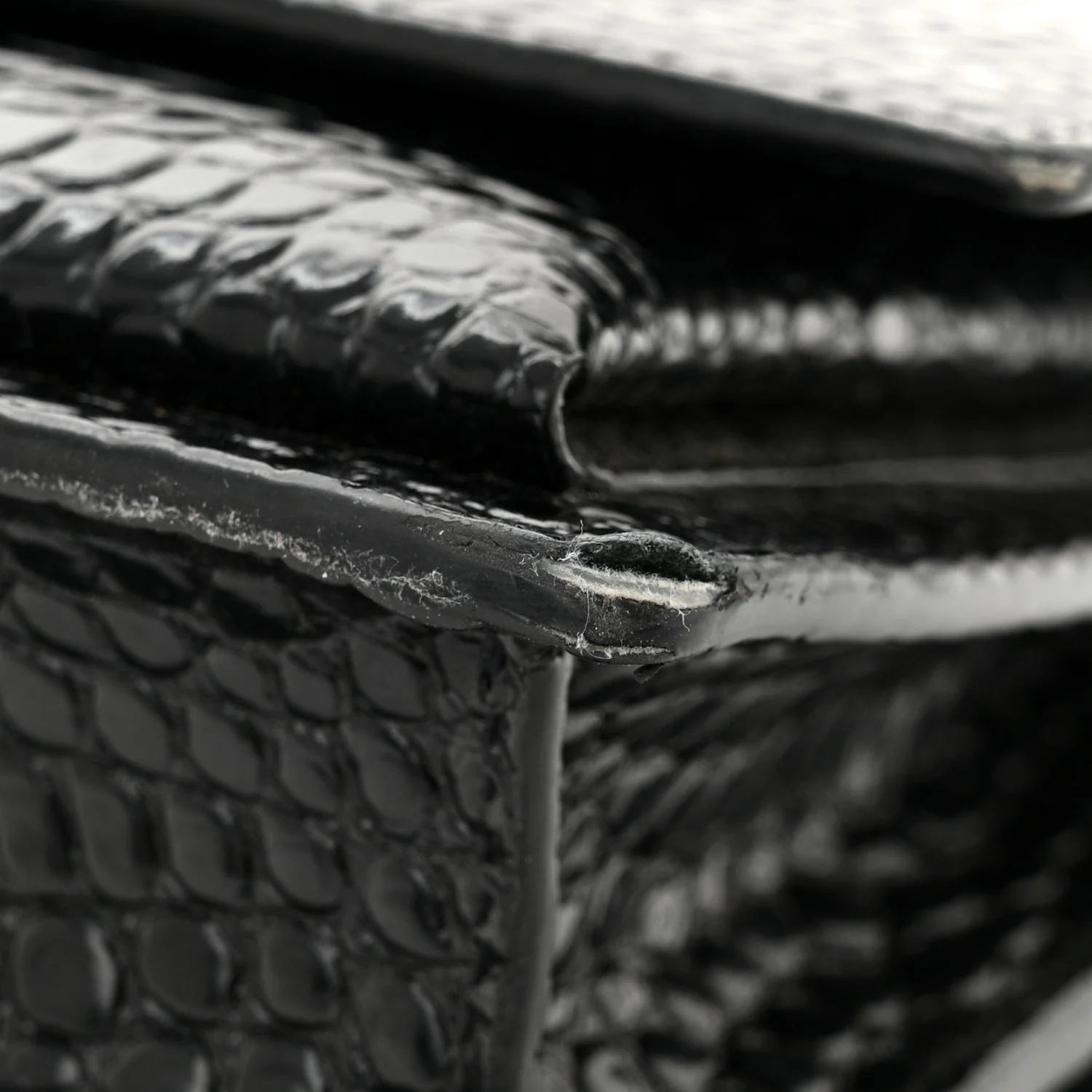 Calfskin Crocodile Embossed Medium Monogram Sunset Black