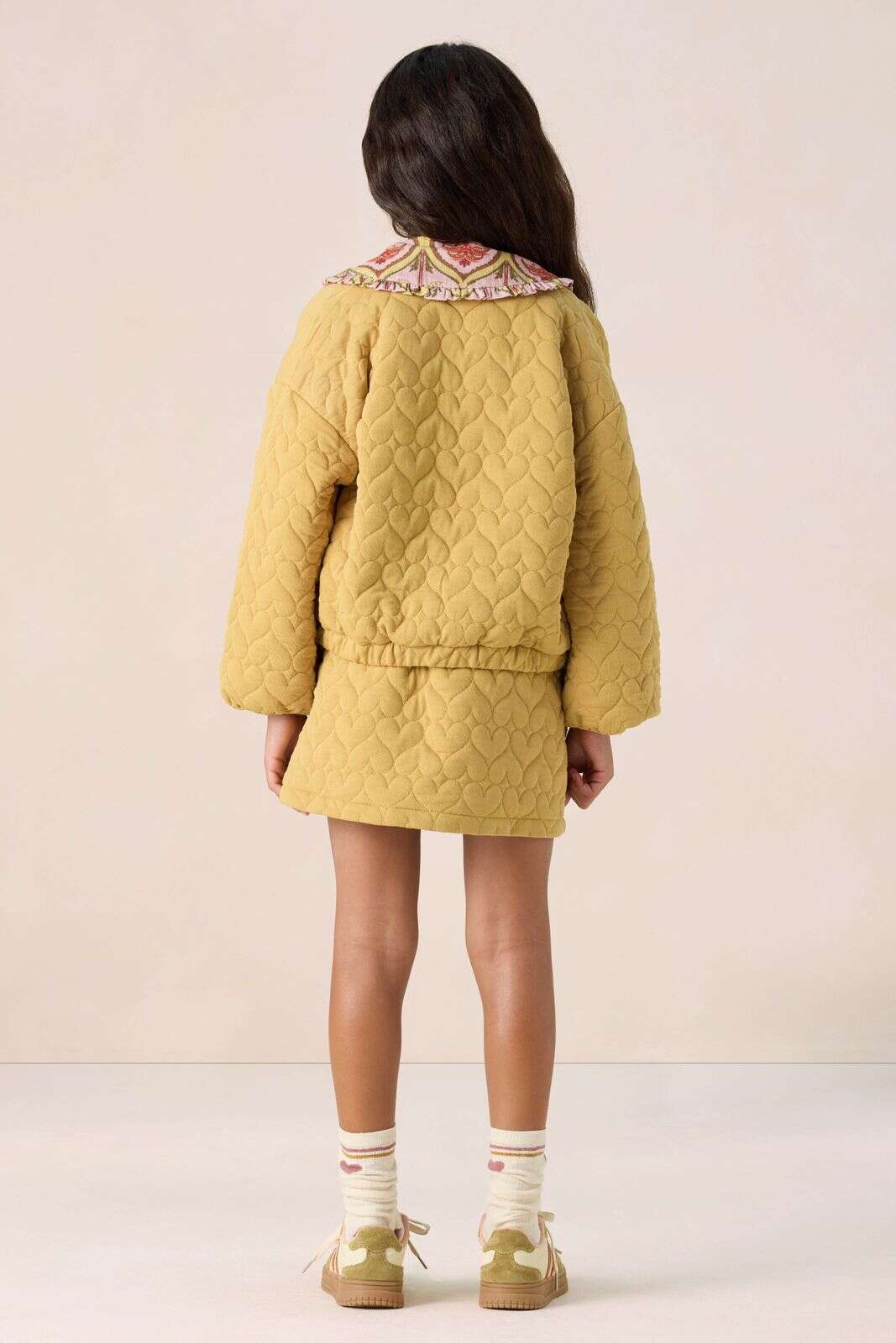 Gele quilted jas met hartjes