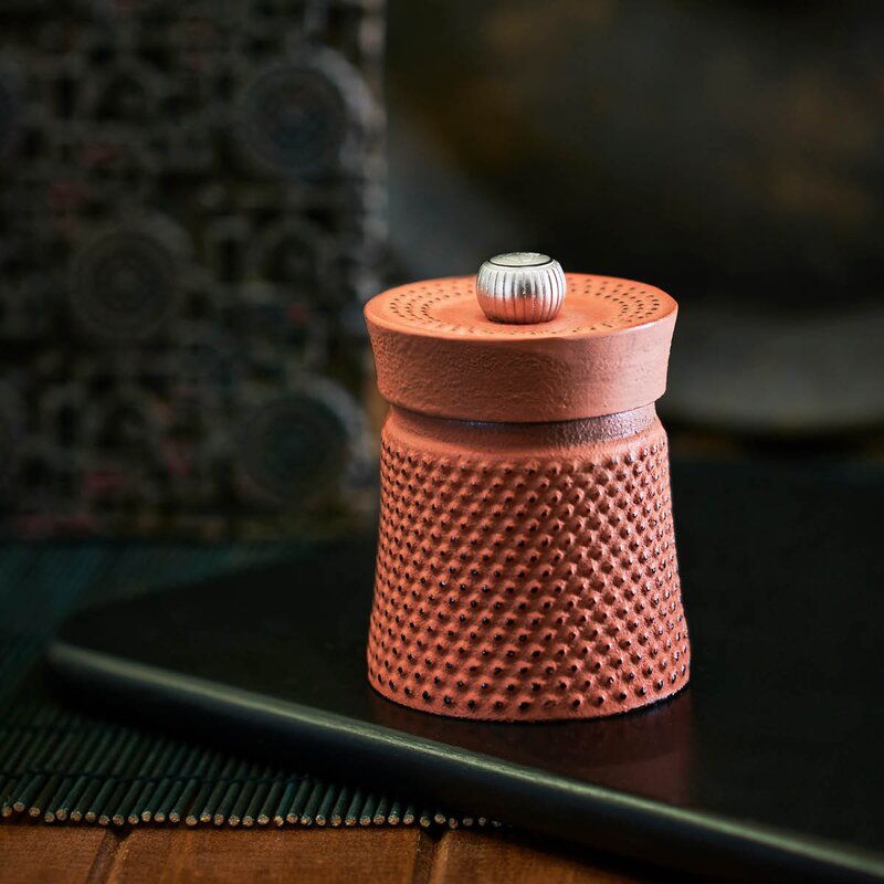 Bali pepperkvern i støpejern 8 cm oransje