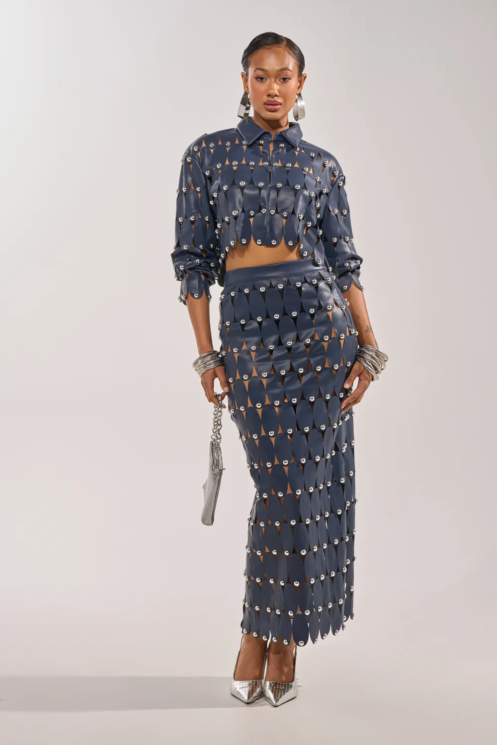 THE SNEAK PEEK STUDDED PU MIDI SKIRT IN NAVY - Akira Store