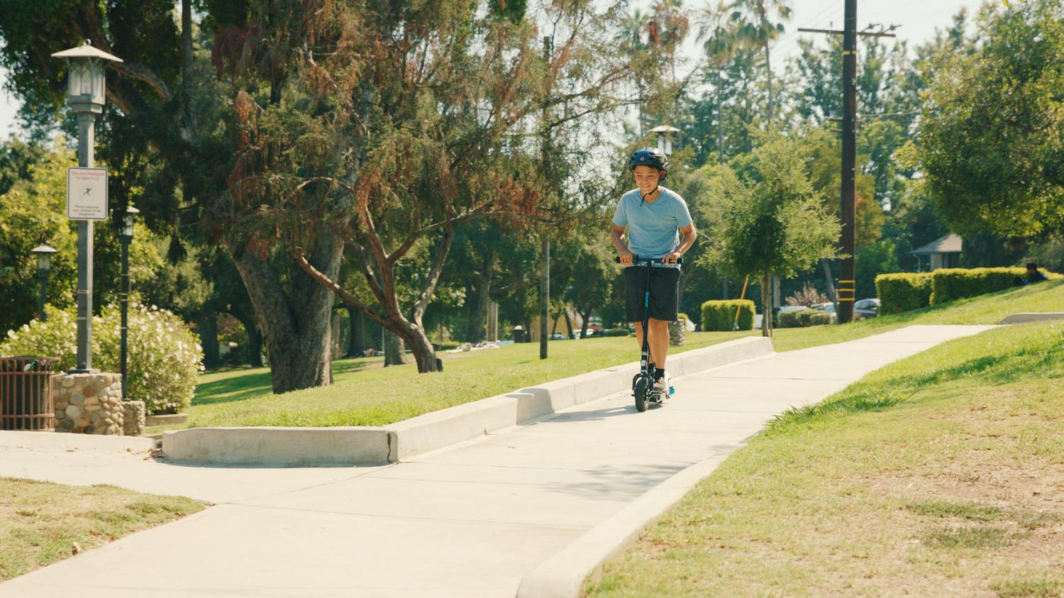 Power Core E100 Electric Scooter with Aluminum Deck Red. Ages 8+ and Up to 120 lb. 8#8243; Pneumatic Front Tire. Up to 11 mph and Up to 60 Mins of Ride Time. 100W Hub Motor. Unisex - Image 3