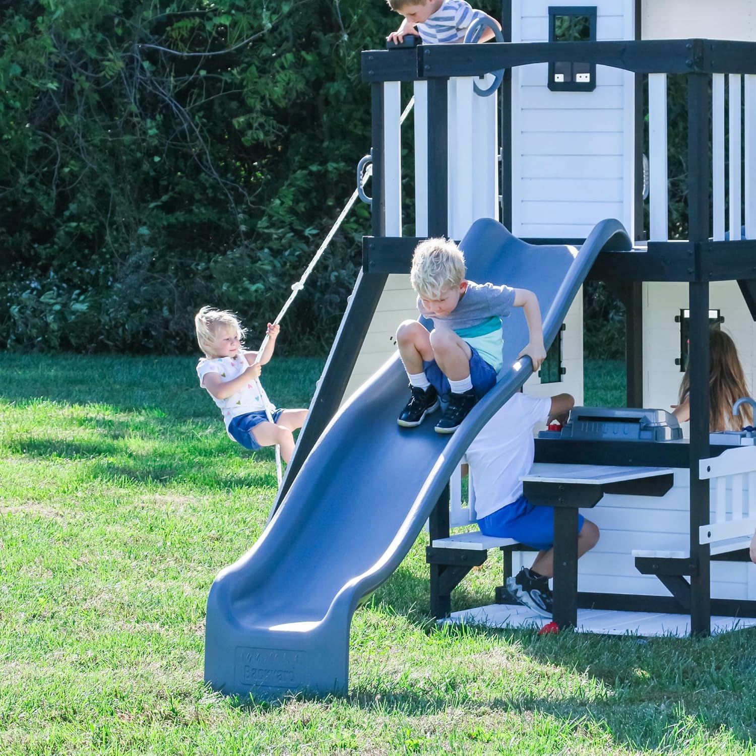 Canyon Creek Cedar Wood Swing Set with Wave Slide, Clubhouse, Play Kitchen, Picnic Area, Belt Swings, Web Swing, Rock Wall, Balconies,…