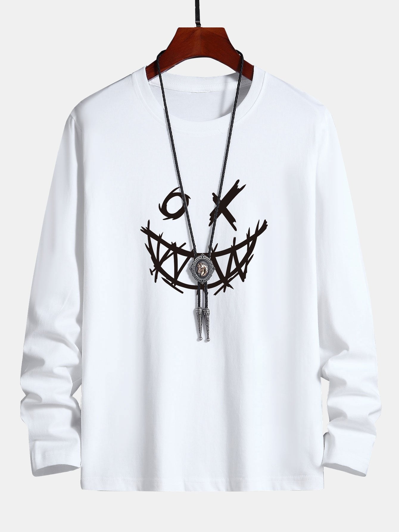 T-shirt en coton à manches longues avec imprimé de visage effrayant