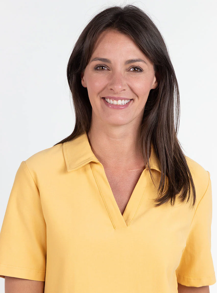 Polo femme en maille de coton jaune épicé