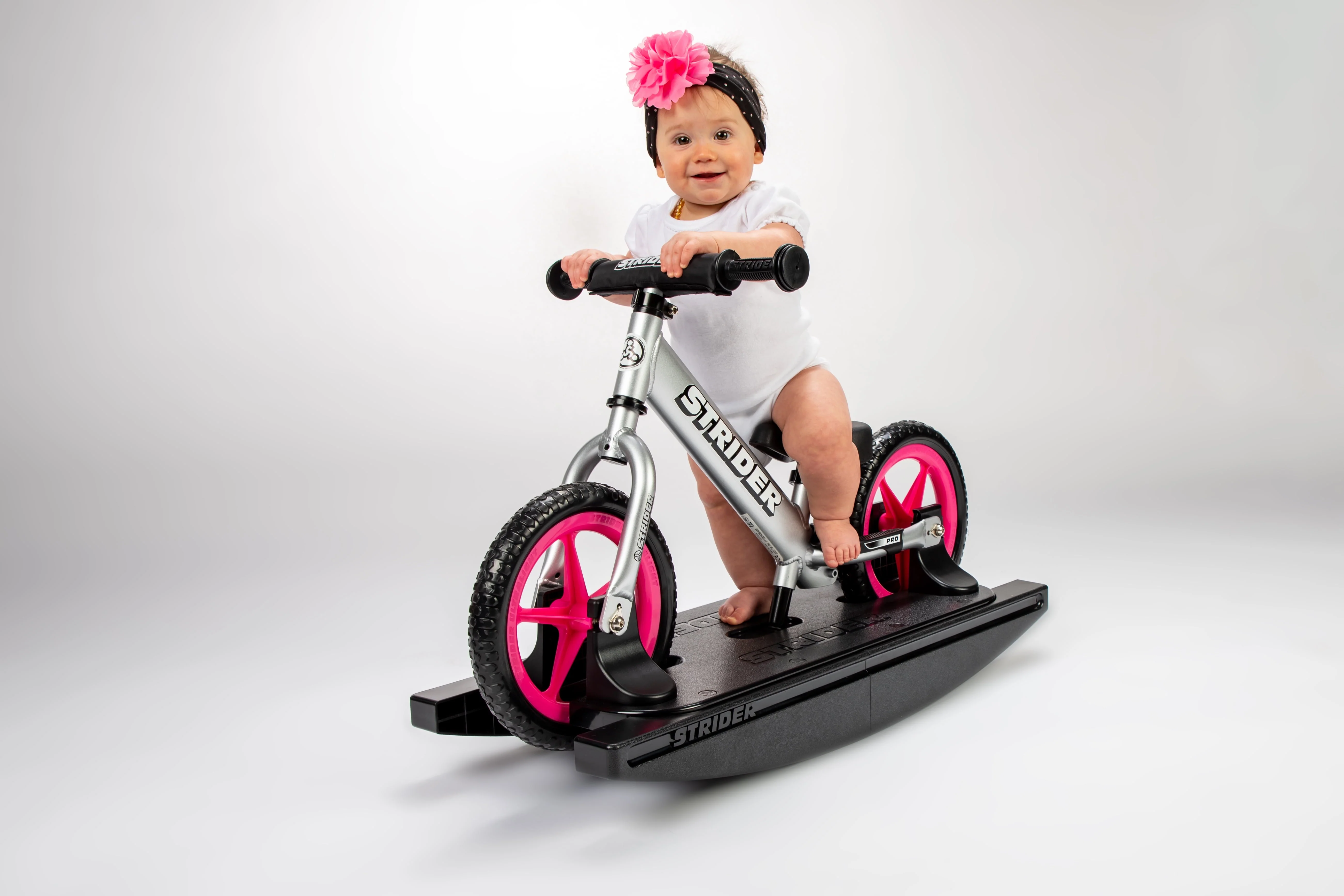Strider - 12 Pro 2 - in - 1 Rocking Balance Bike, Ages 6 Months to 5 Years - Silver