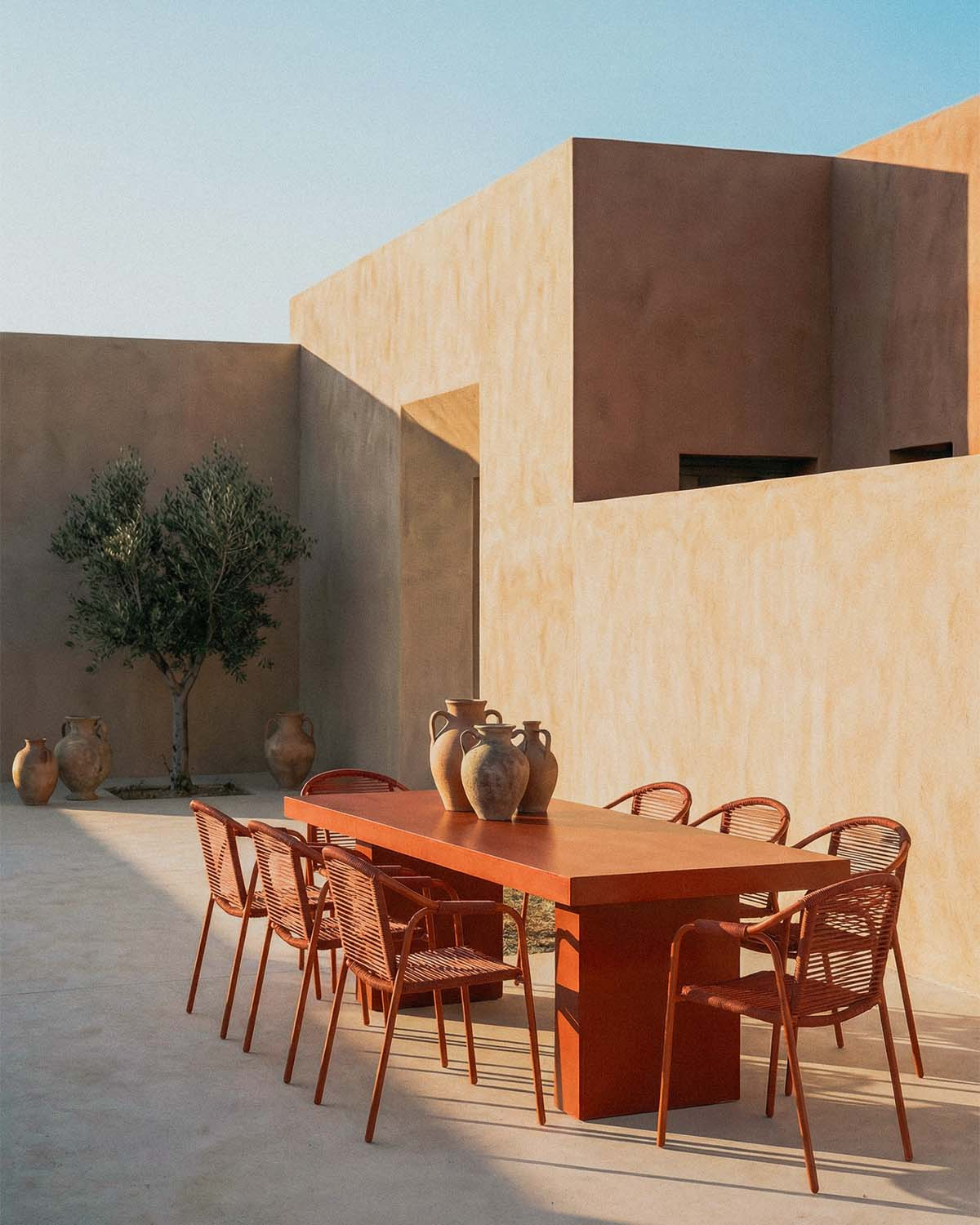 Set Itxaso - Murna - Set de Mesa Rectangular de Cemento (245x110 cm) Itxaso y 8 Sillas con Reposabrazos de Metal y Cuerda Murna de Exterior