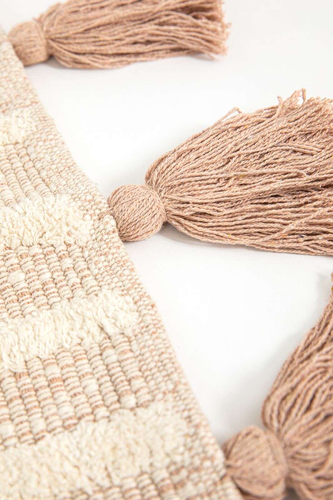 Beige badmat met geometrische figuren