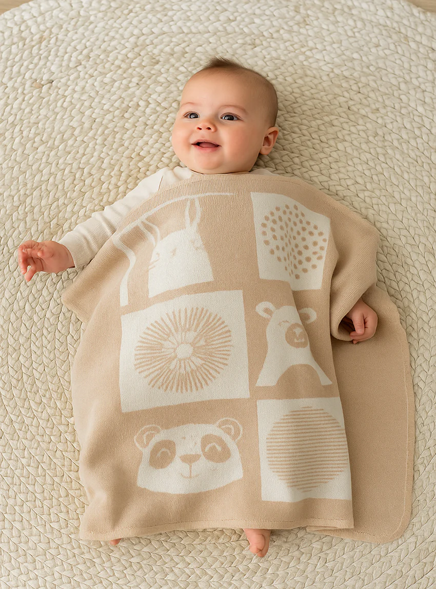 Couverture bébé  laine mérinos motif animaux beige pastel