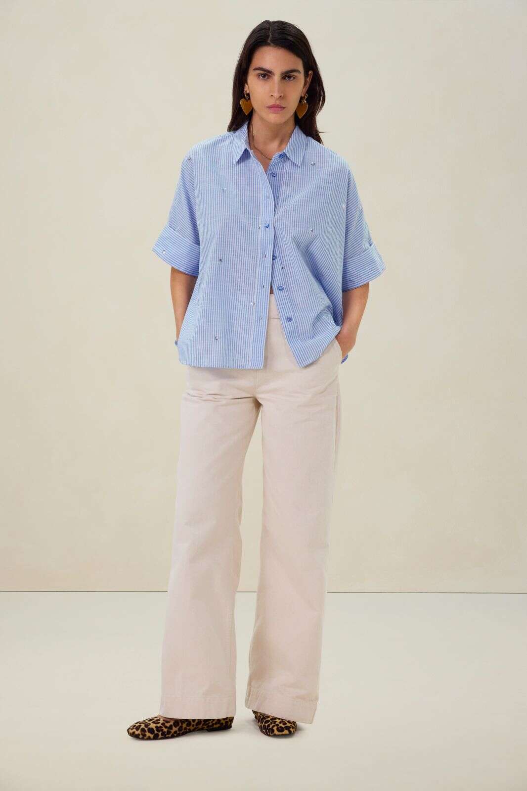 Blauwe blouse met pailletten details