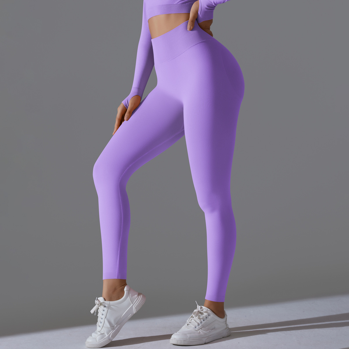 Peach-colored tight-fitting running, fitness, and yoga pants