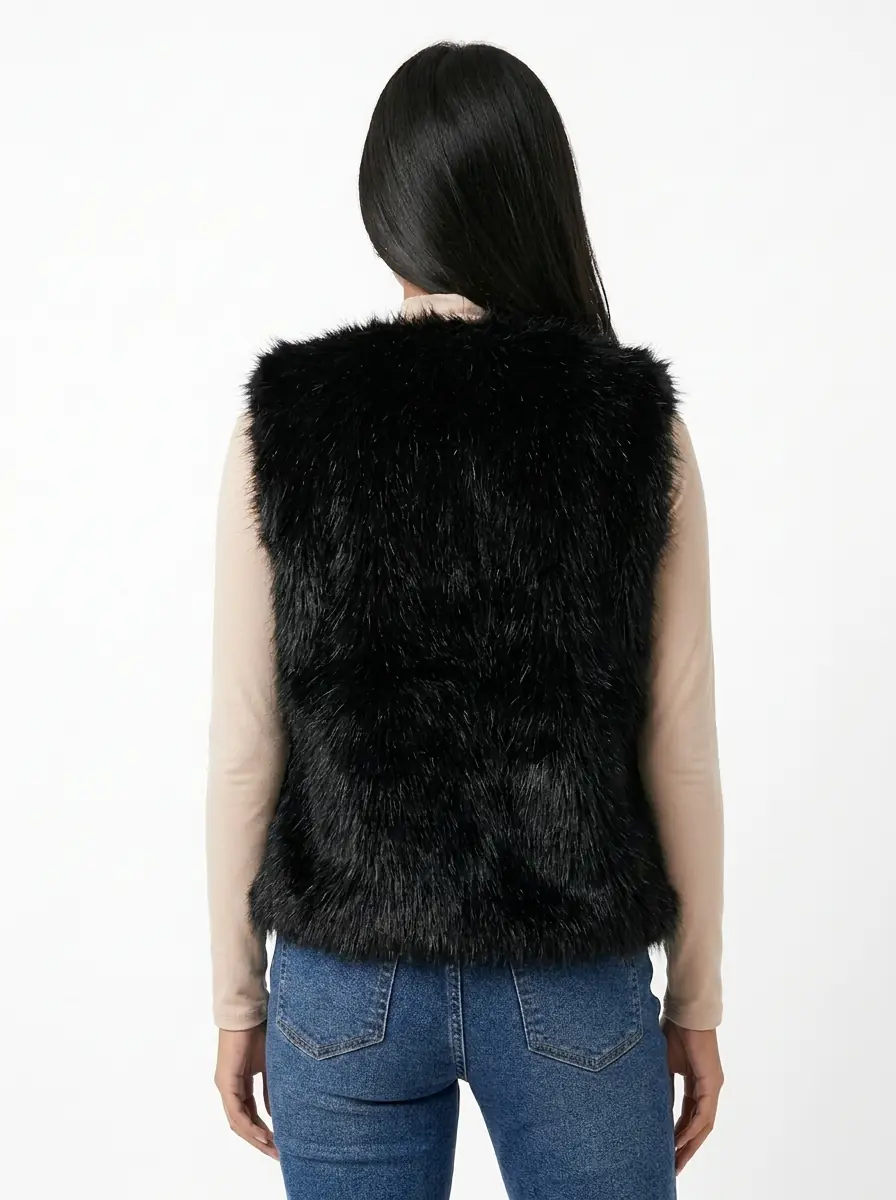 Back view of a women's black faux fur vest