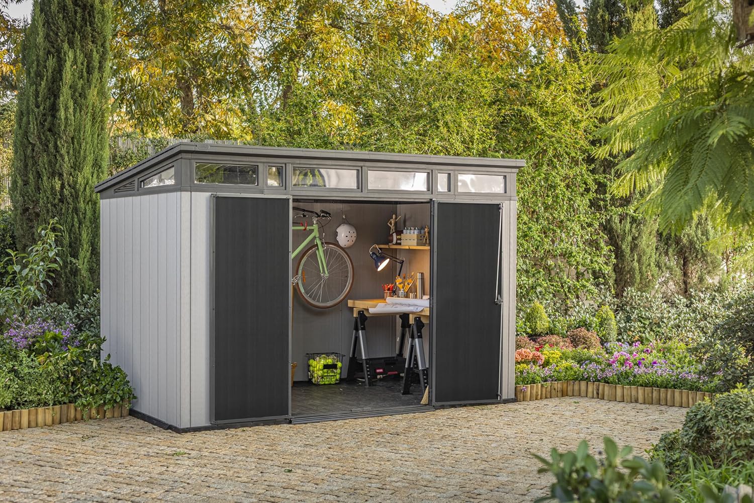 Keter Artisan 11x7 Modern Resin Outdoor Storage Shed Kit-Perfect to Store Patio Furniture. Garden Tools Bike Accessories. Beach Chairs and Lawn Mower. Grey & Black